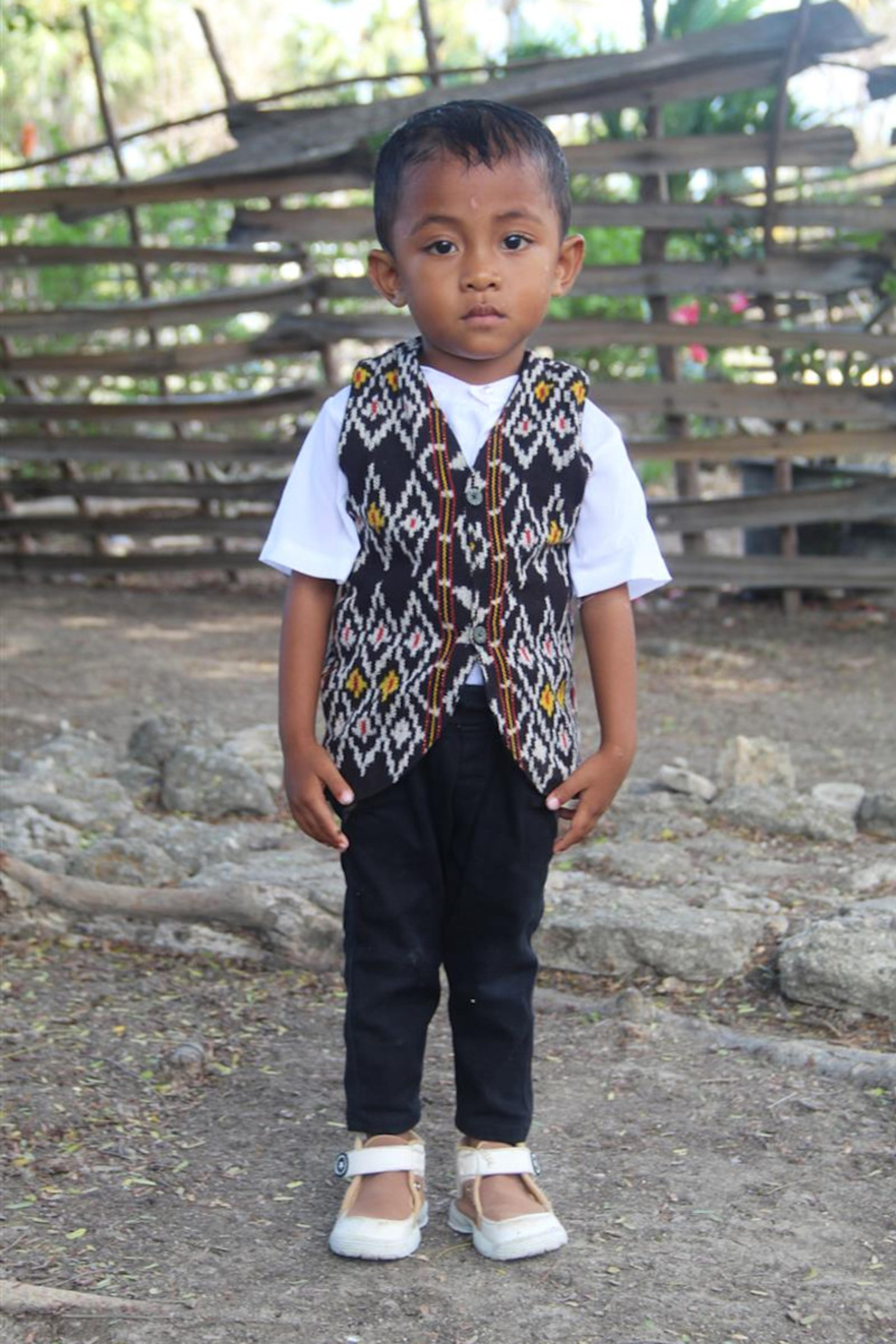 An unsponsored boy named Gio from Indonesia who has waited 544 days for a sponsor.