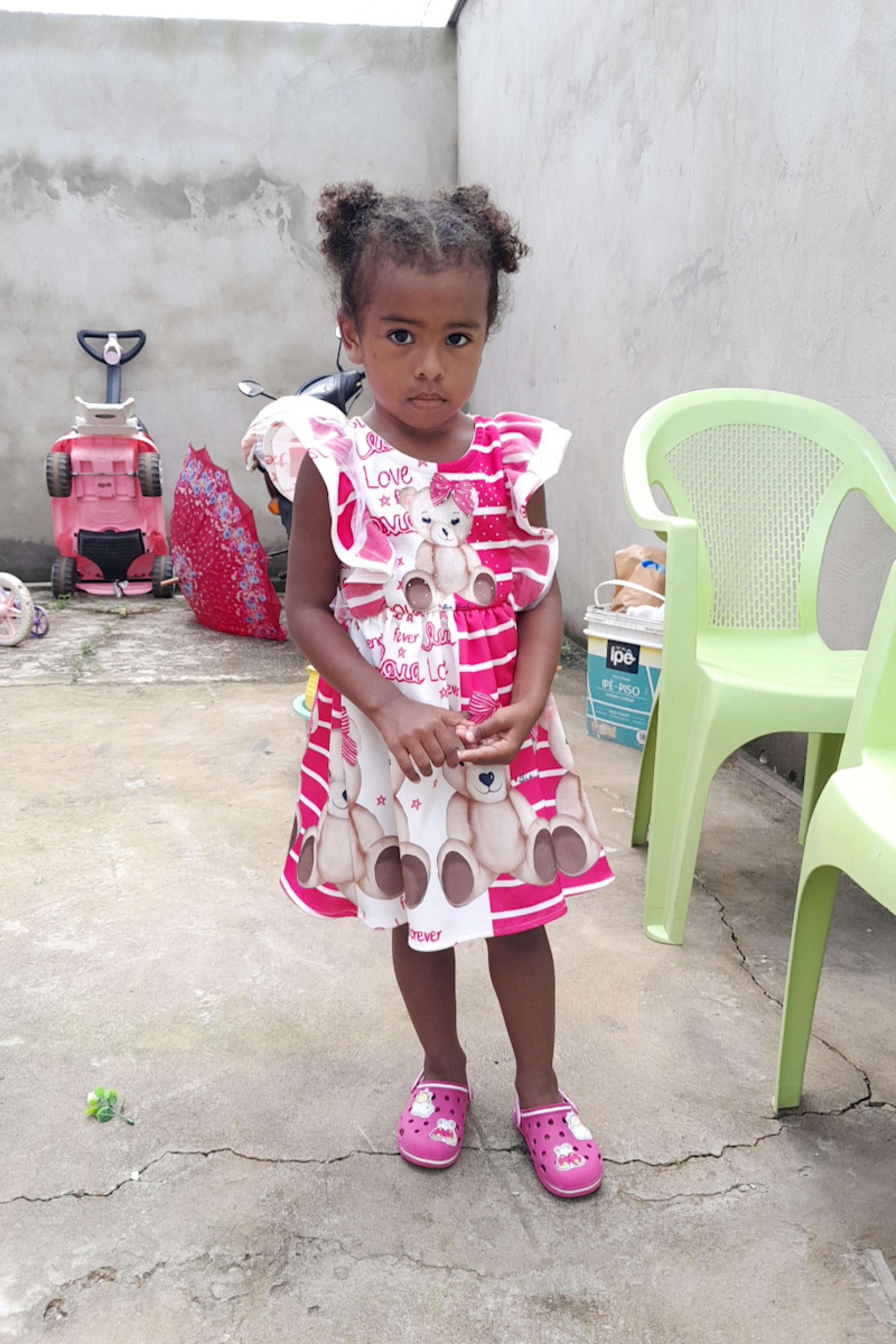 An unsponsored girl named Lalá from Brazil who has waited 580 days for a sponsor.