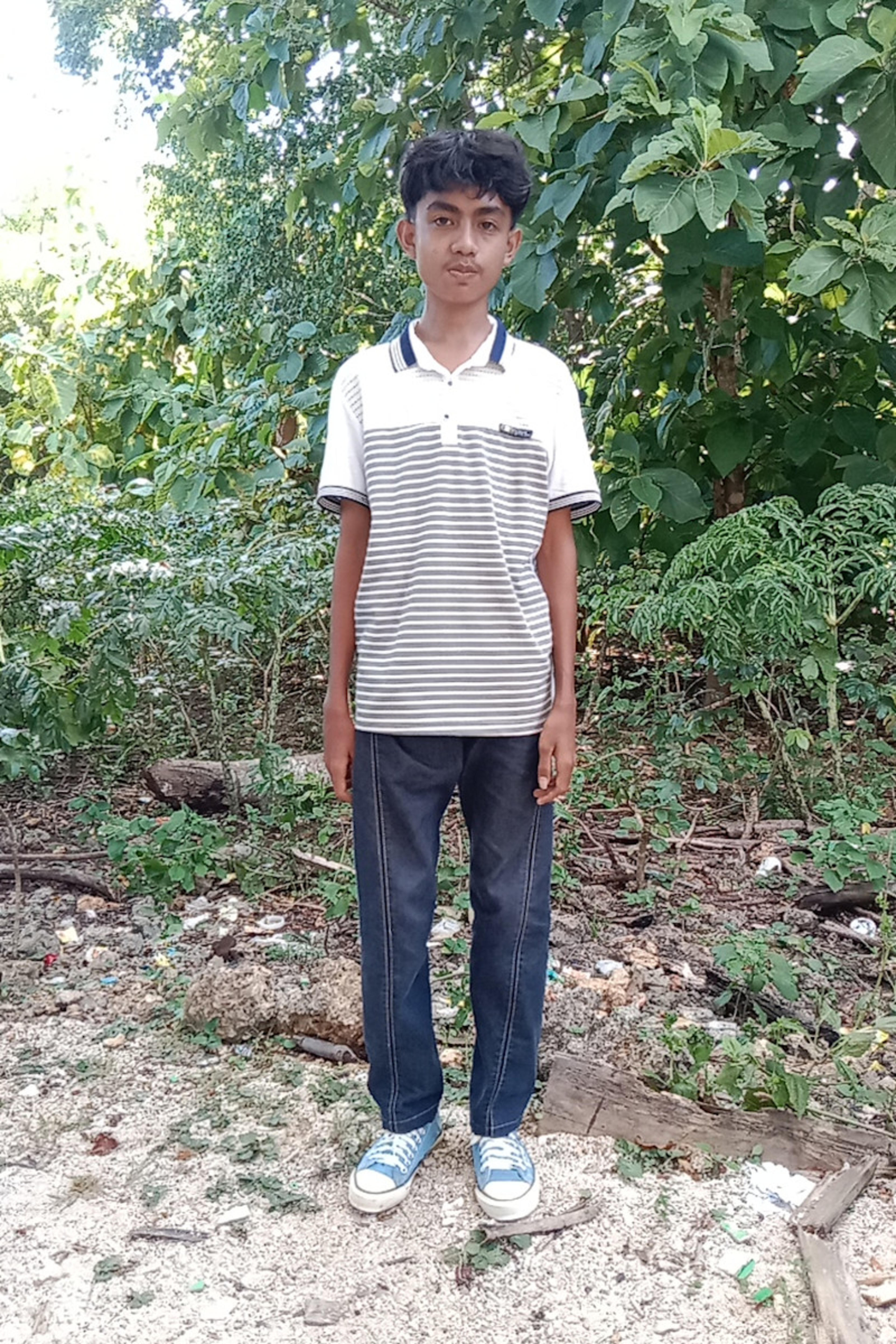 An unsponsored boy named Euricho from Indonesia who has waited 517 days for a sponsor.