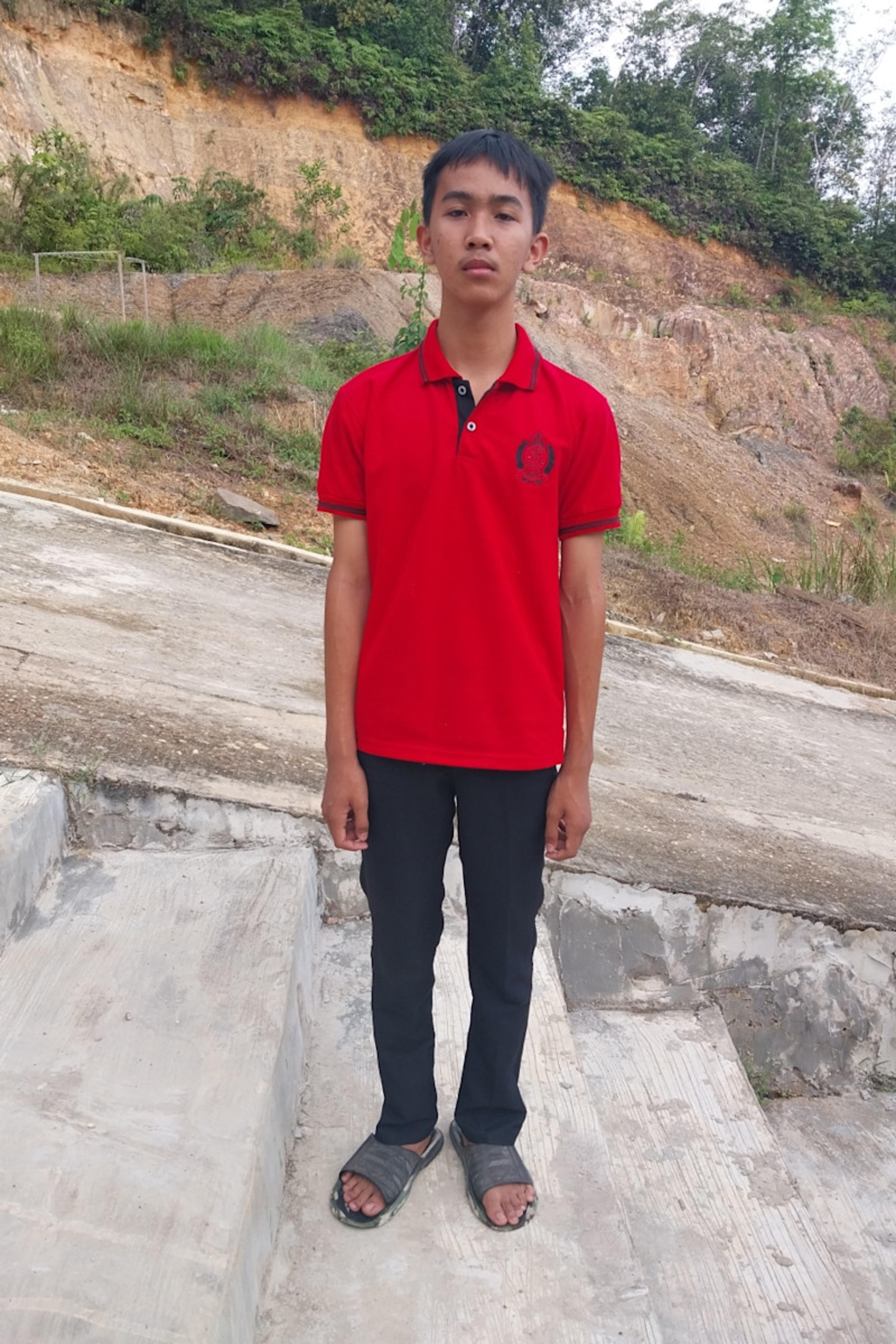 An unsponsored boy named Tenzen from Indonesia who has waited 516 days for a sponsor.