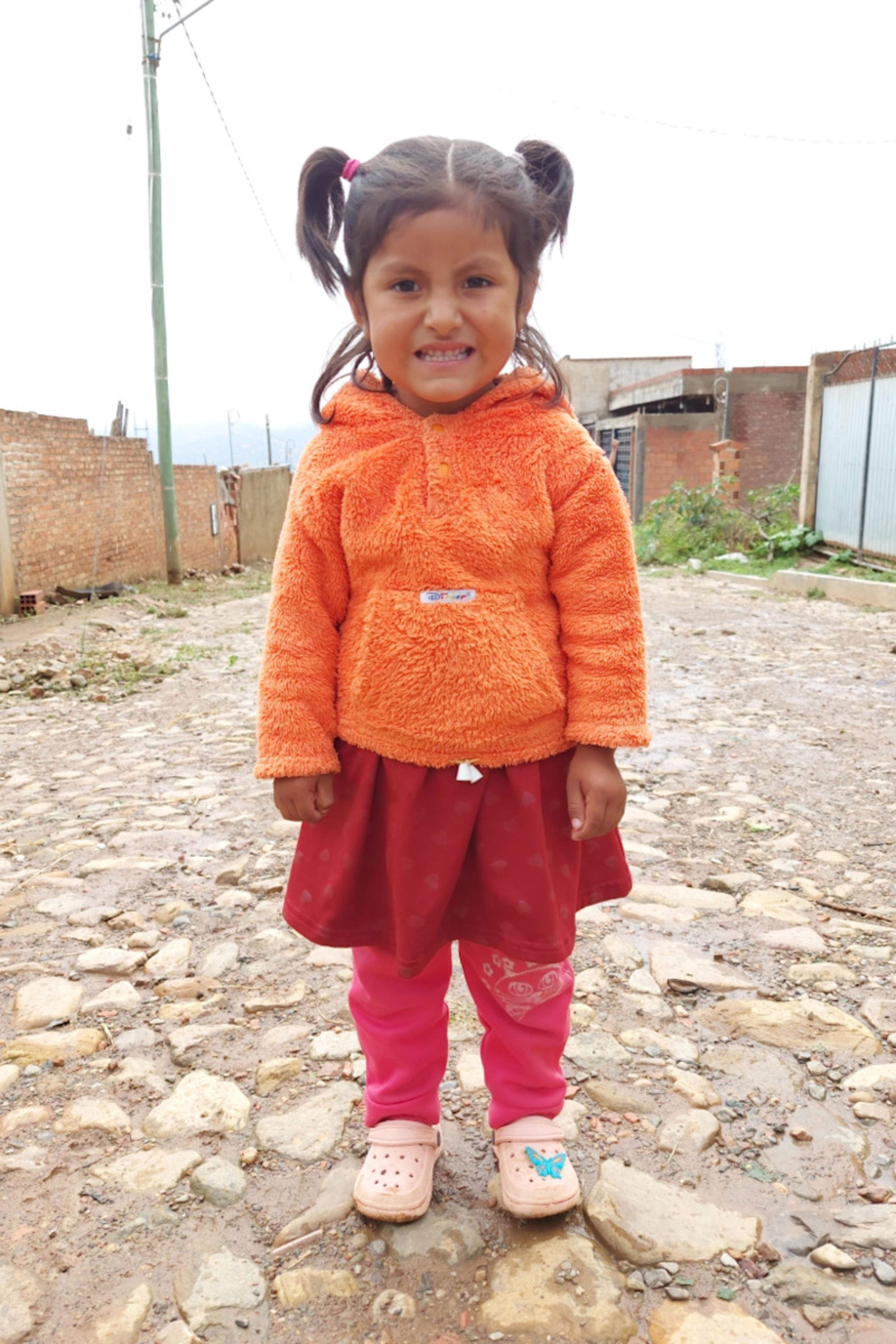 An unsponsored girl named Anali from Bolivia who has waited 526 days for a sponsor.