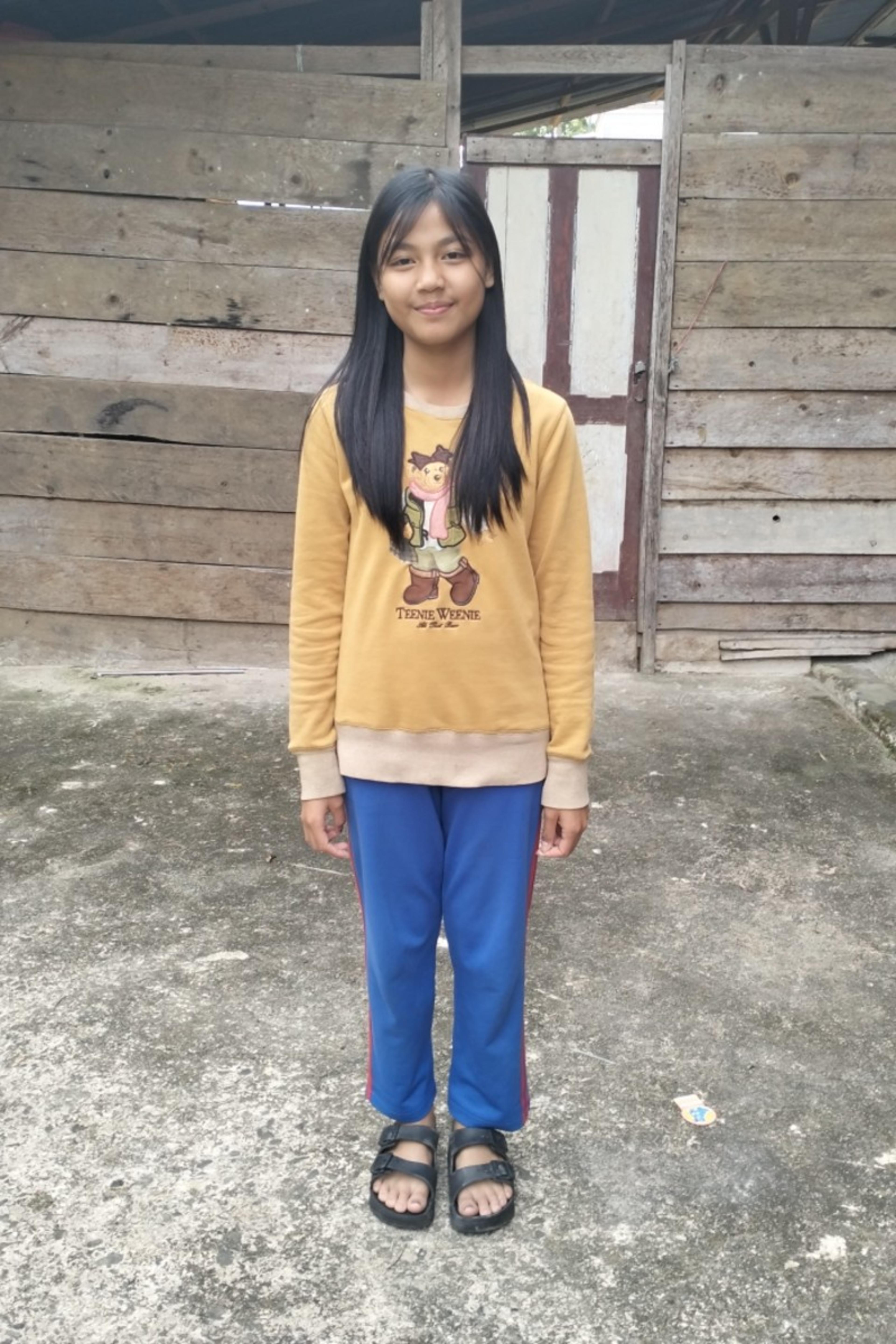 An unsponsored girl named Gebi from Indonesia who has waited 300 days for a sponsor.