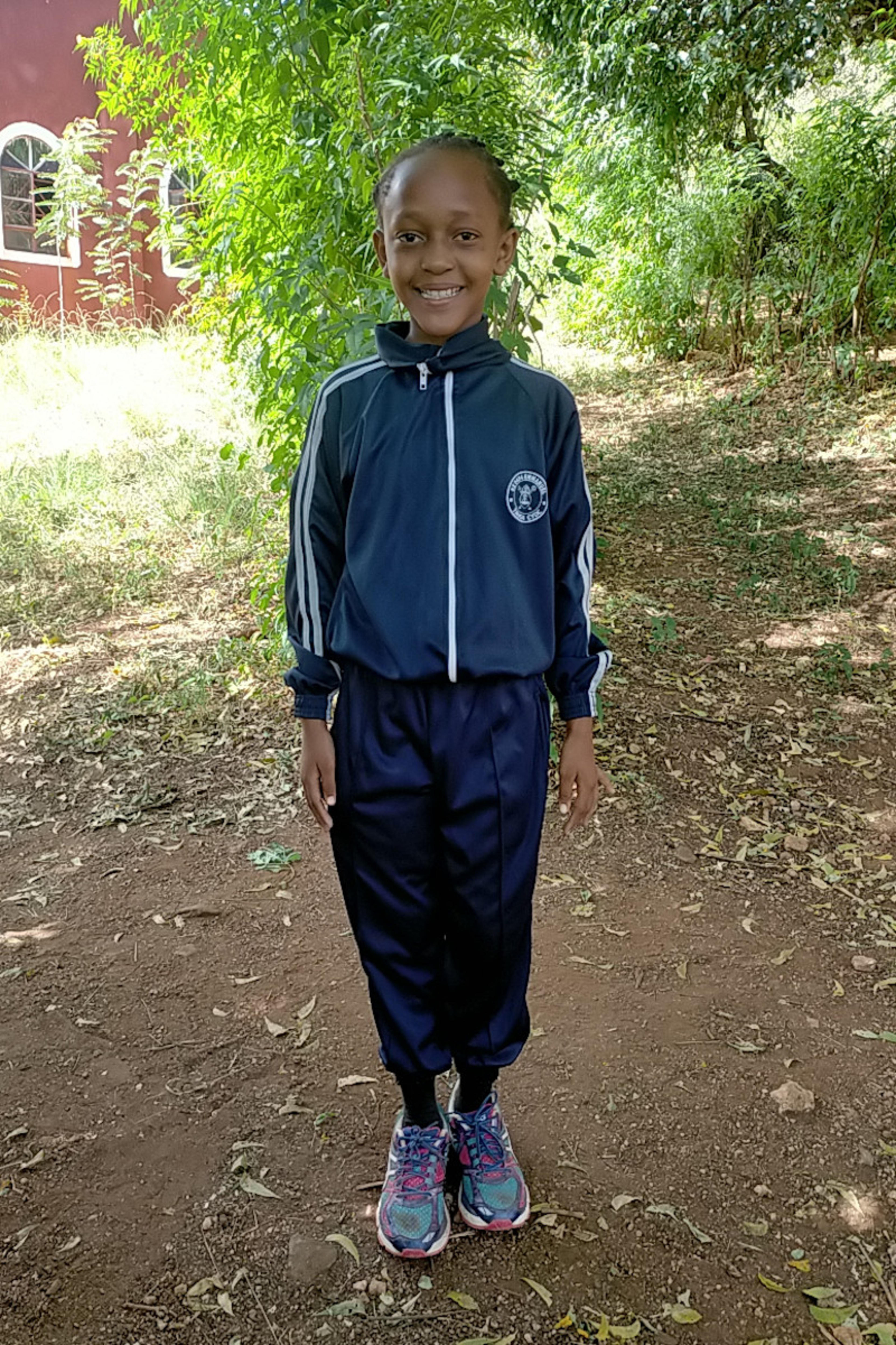 An unsponsored girl named Josephine from Kenya who lives in an AIDS-affected area and has waited 397 days for a sponsor.