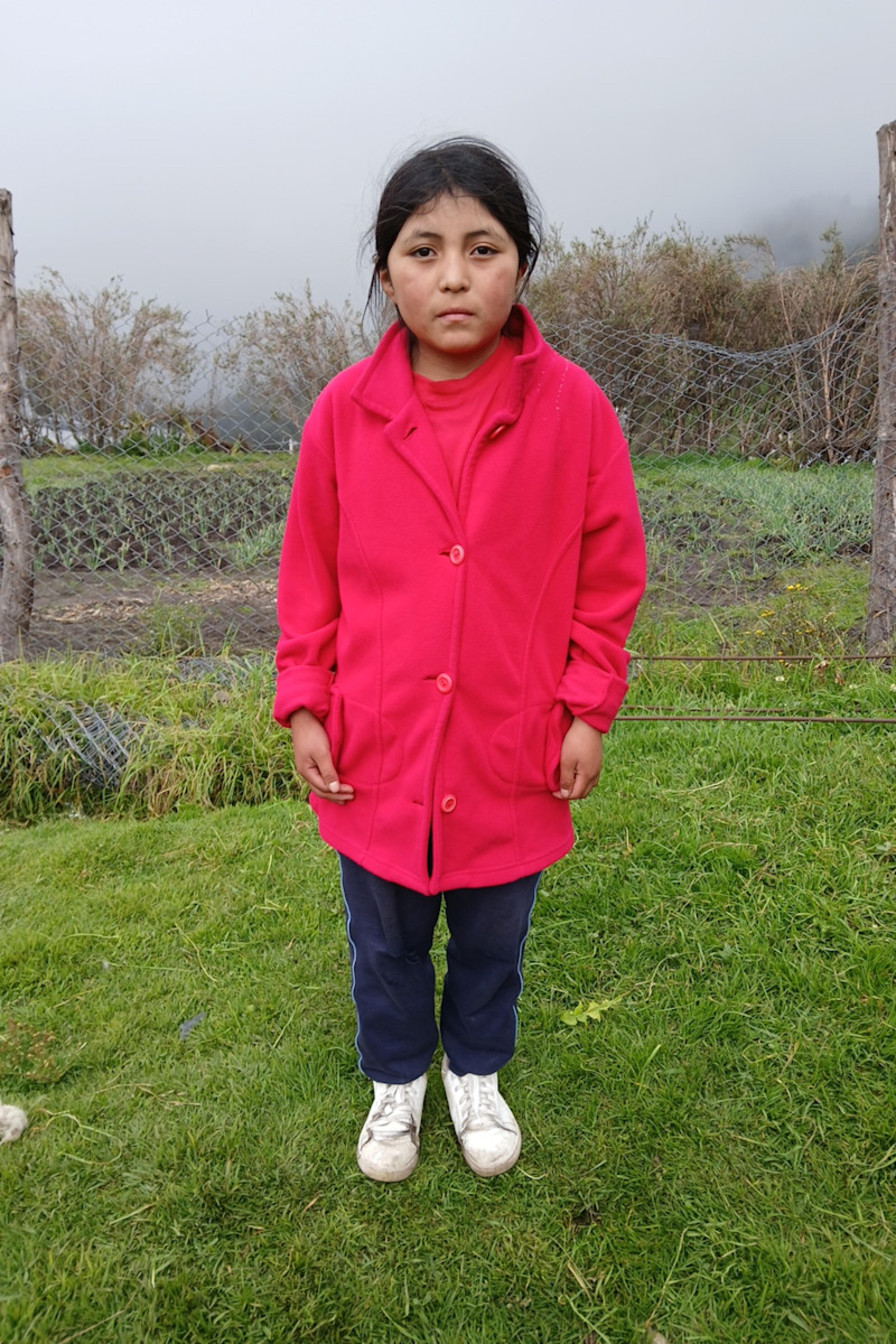 An unsponsored girl named Dina from Ecuador who has waited 541 days for a sponsor.