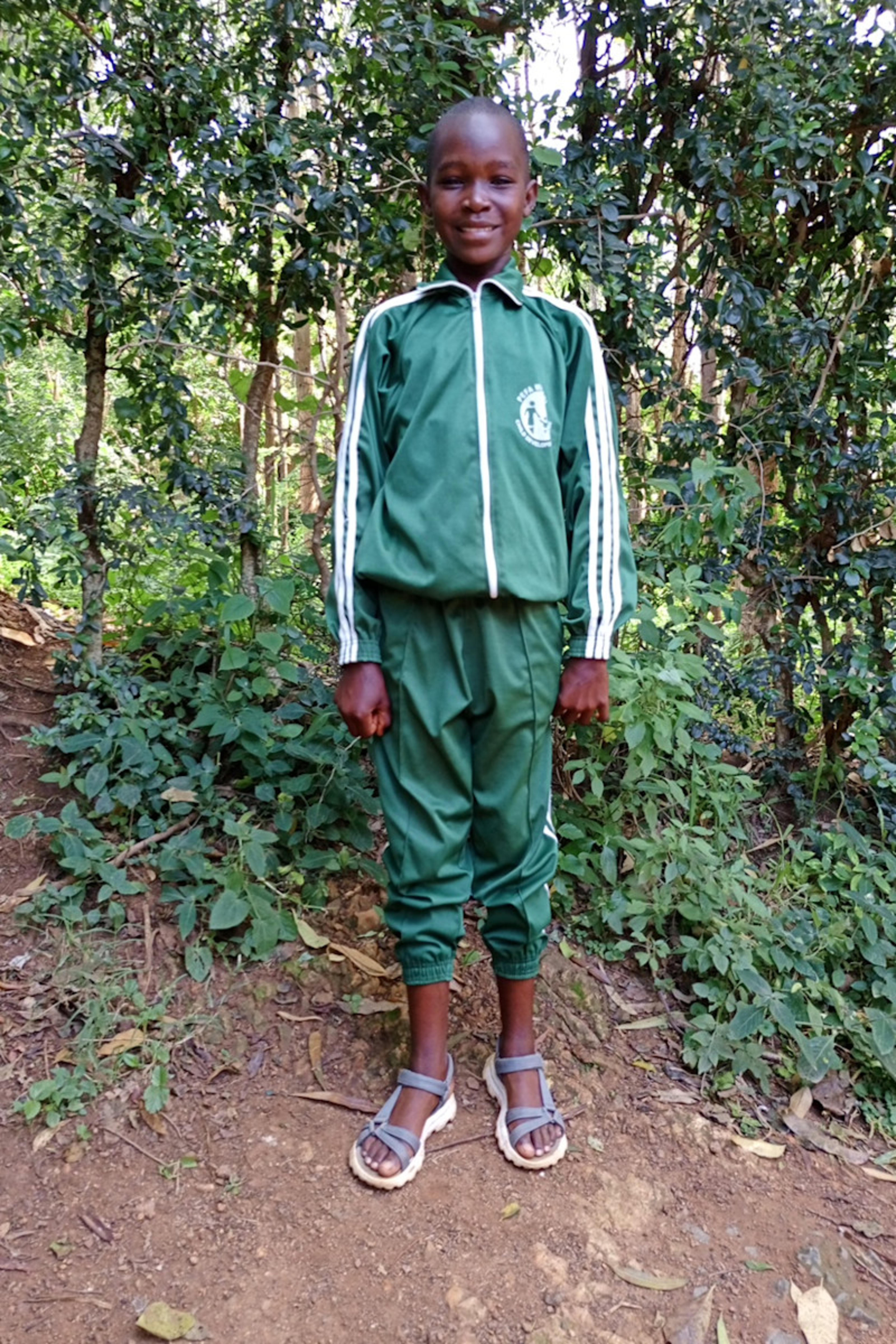 An unsponsored girl named Sharon from Kenya who lives in an AIDS-affected area and has waited 543 days for a sponsor.
