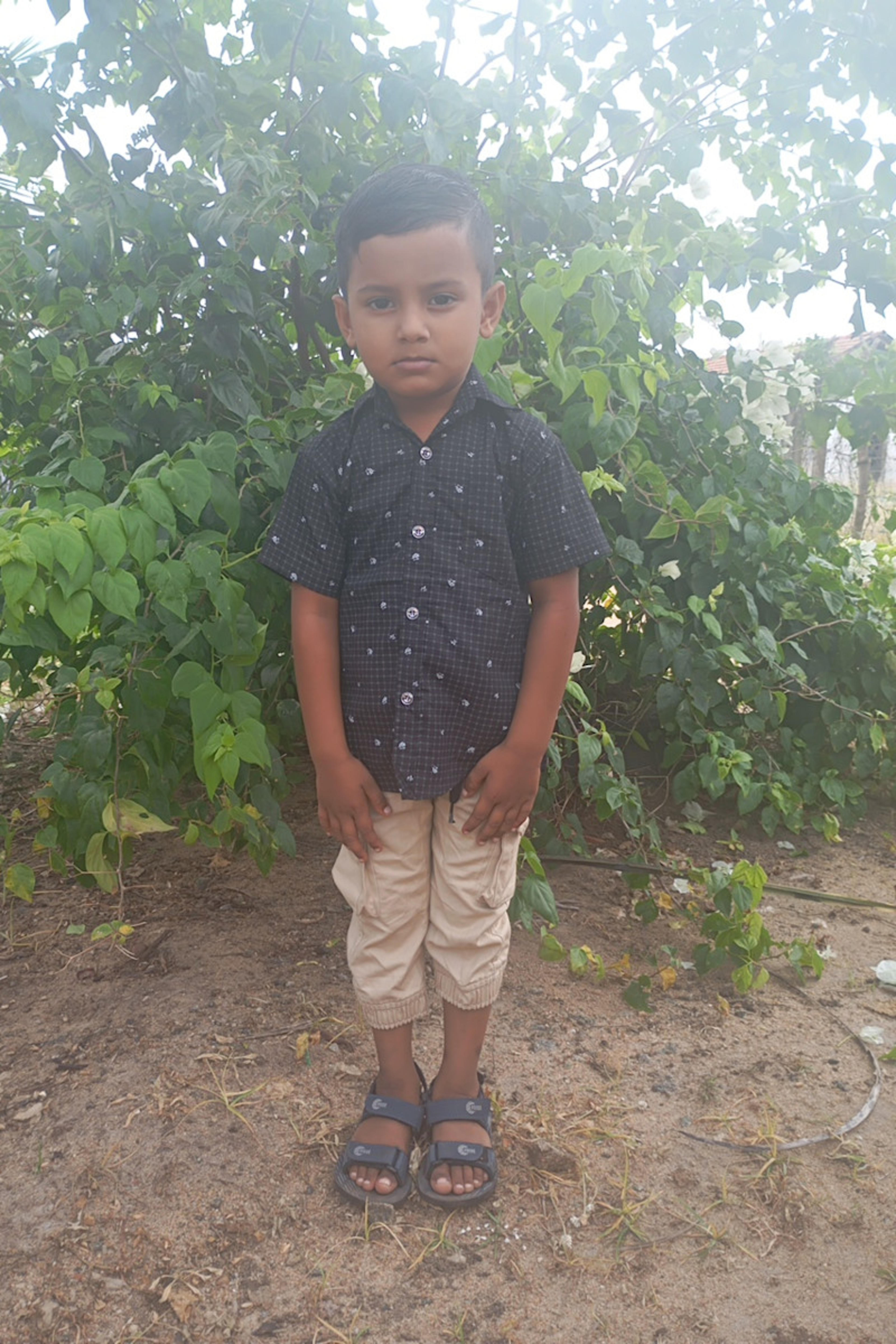 An unsponsored boy named Farhan from Sri Lanka who has waited 525 days for a sponsor.