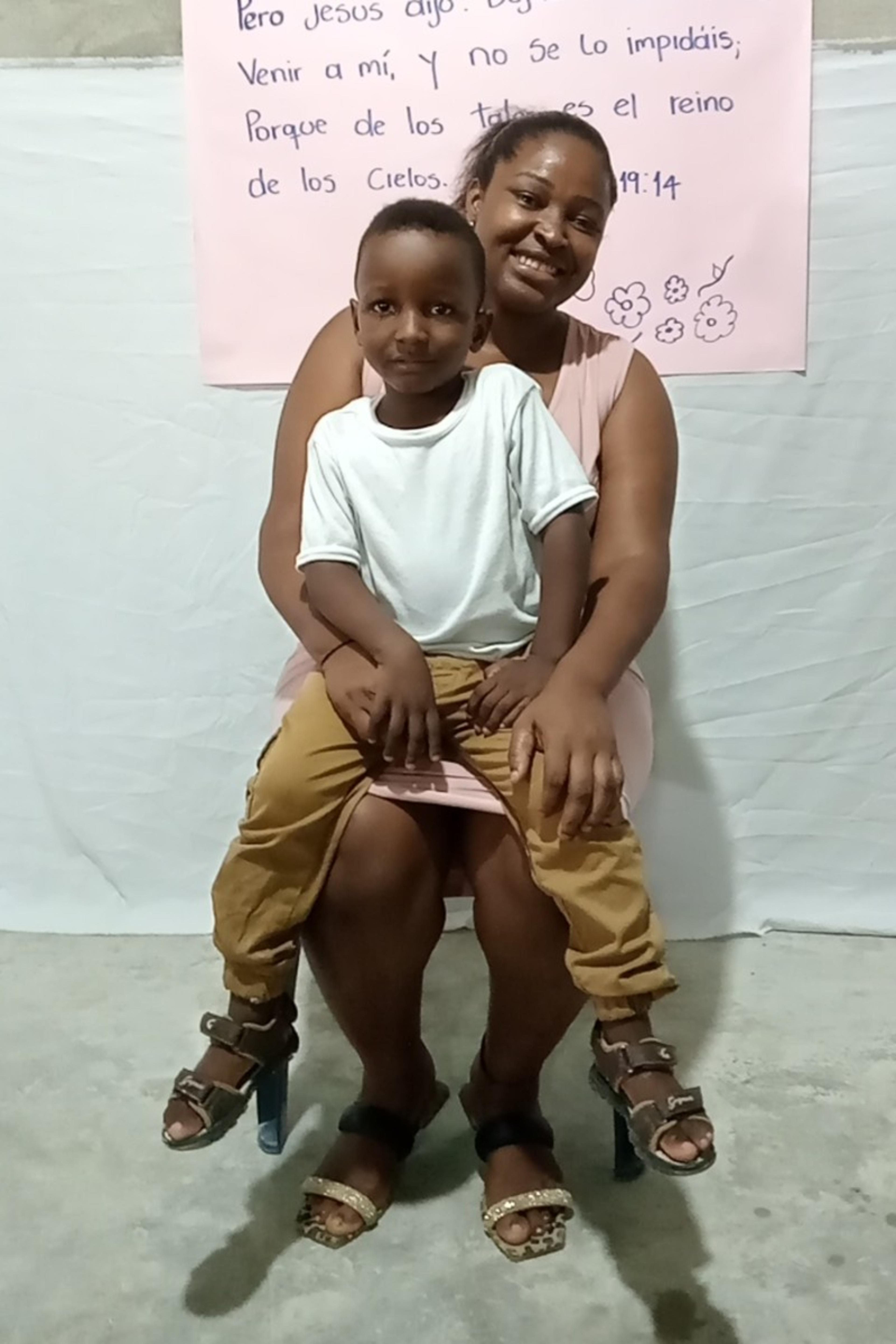 An unsponsored boy named Herlin from Colombia who has waited 496 days for a sponsor.