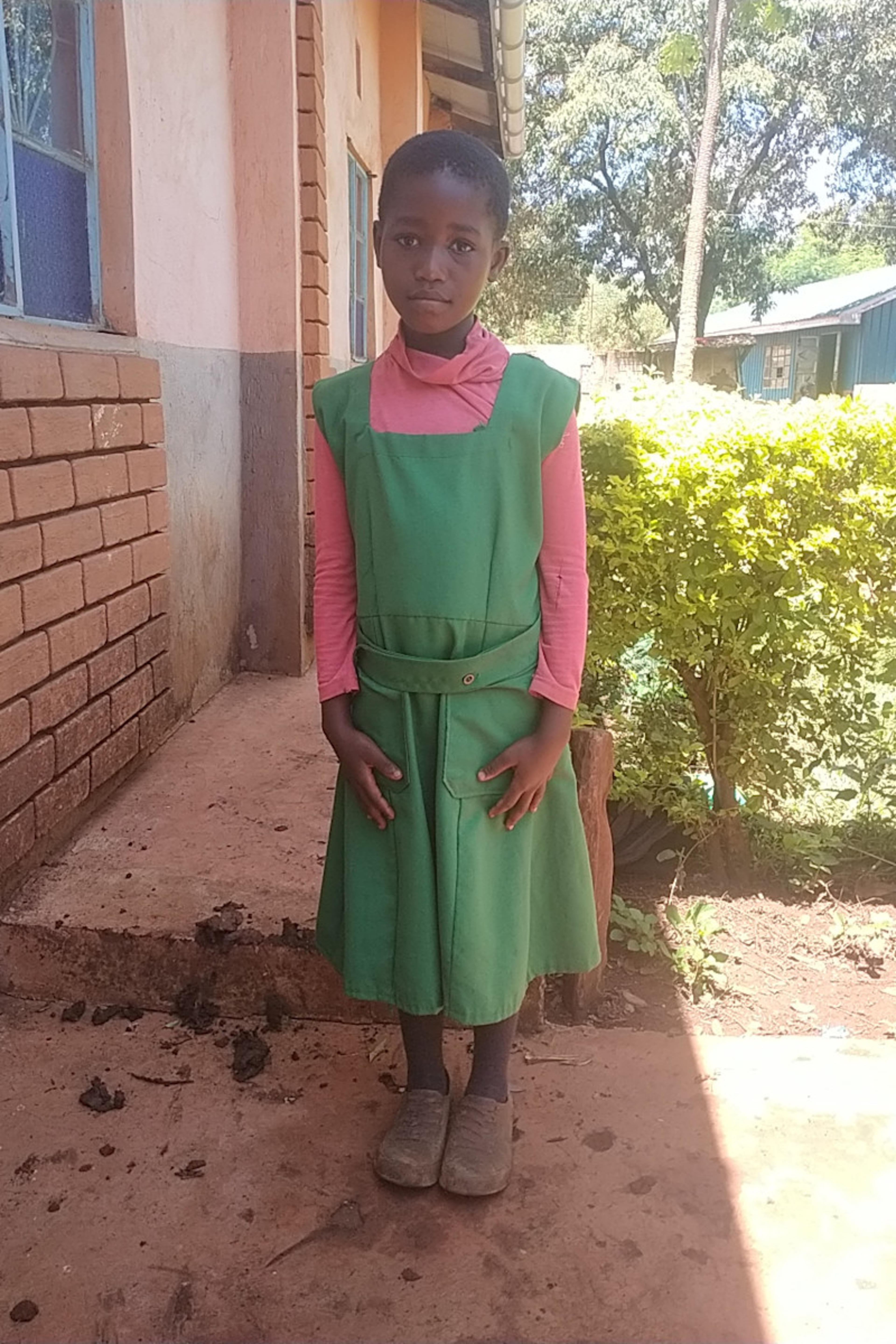 An unsponsored girl named Vivian from Kenya who lives in an AIDS-affected area and has waited 498 days for a sponsor.