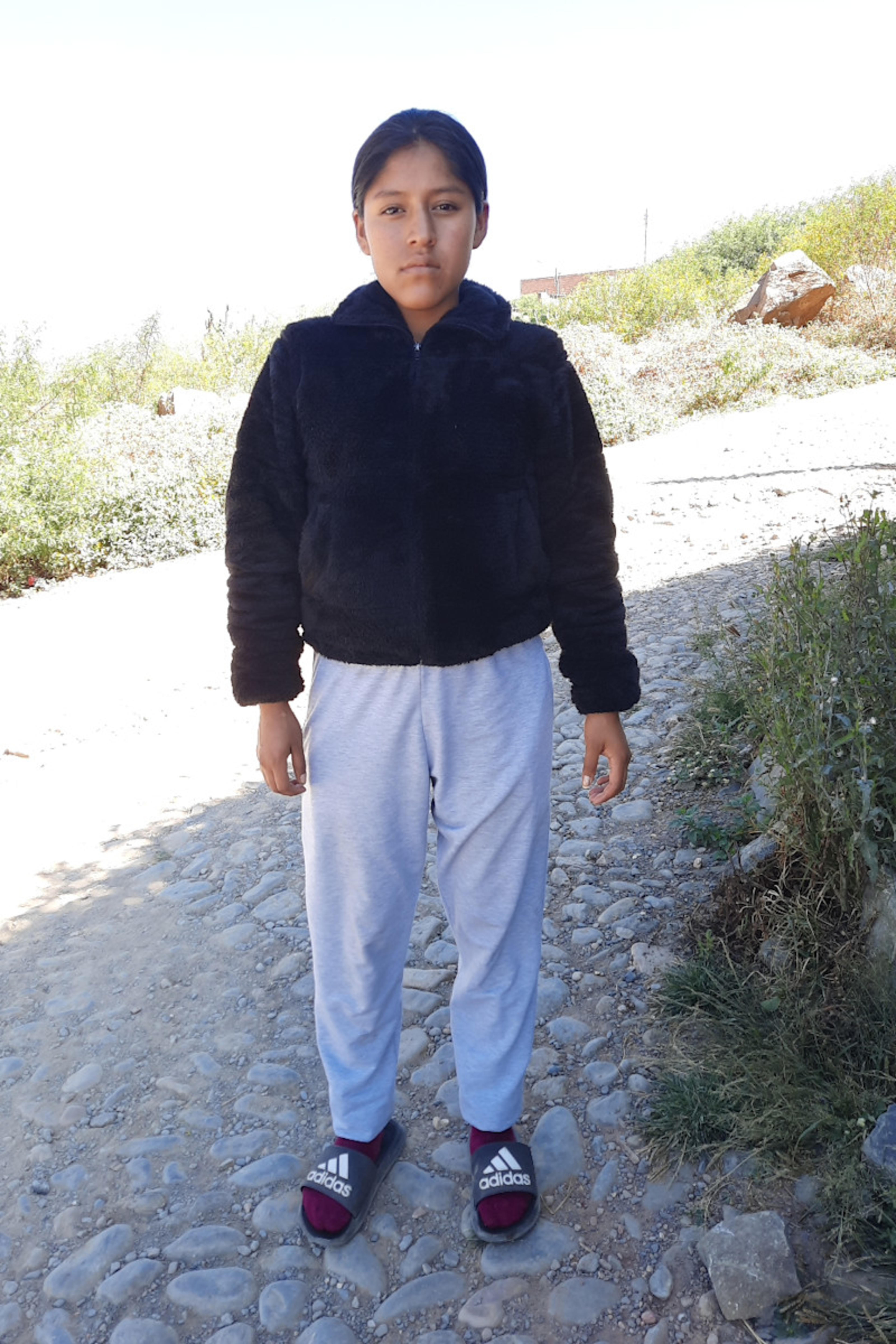 An unsponsored girl named Arminda from Bolivia who has waited 517 days for a sponsor.