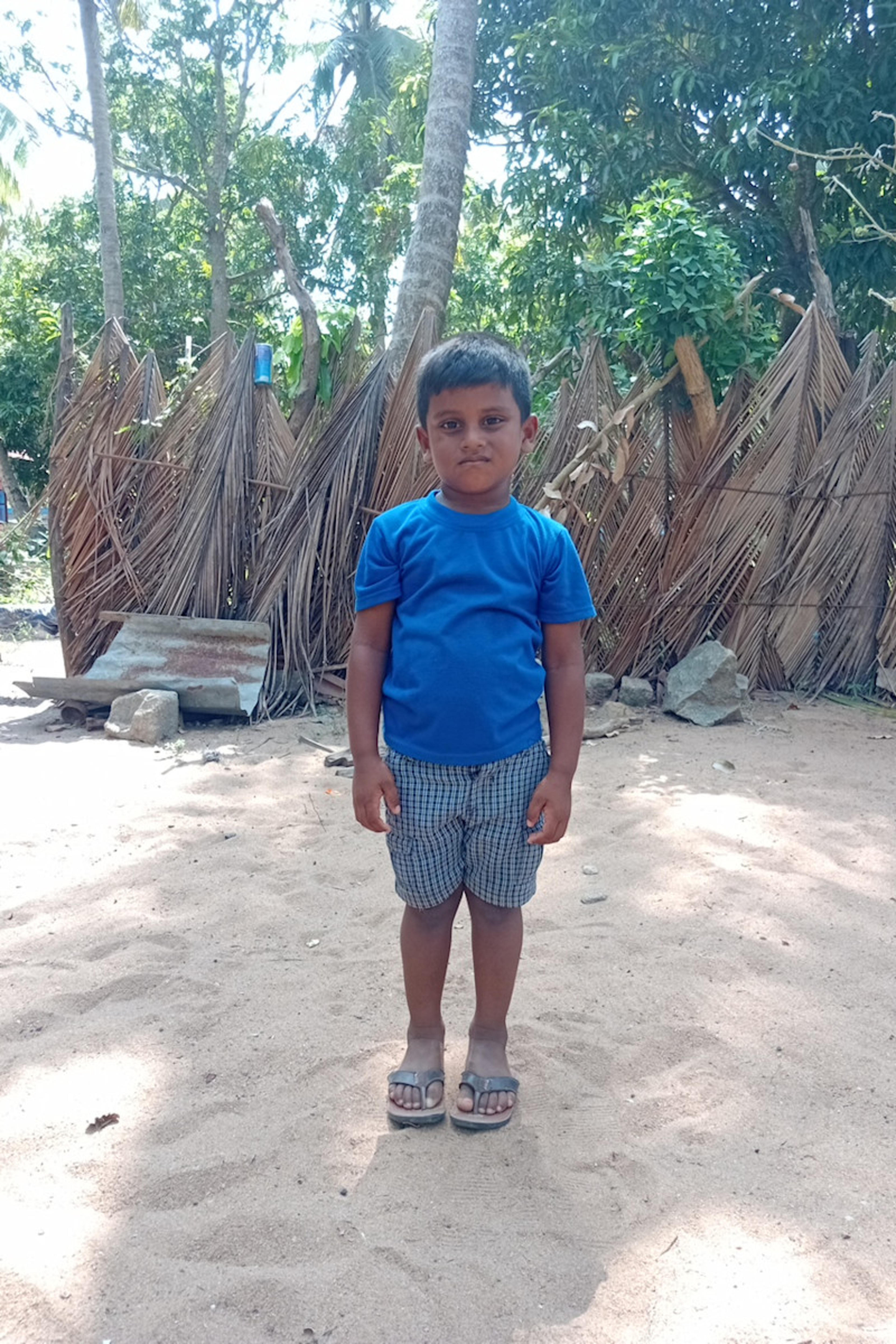 An unsponsored boy named Lenislas from Sri Lanka who has waited 525 days for a sponsor.
