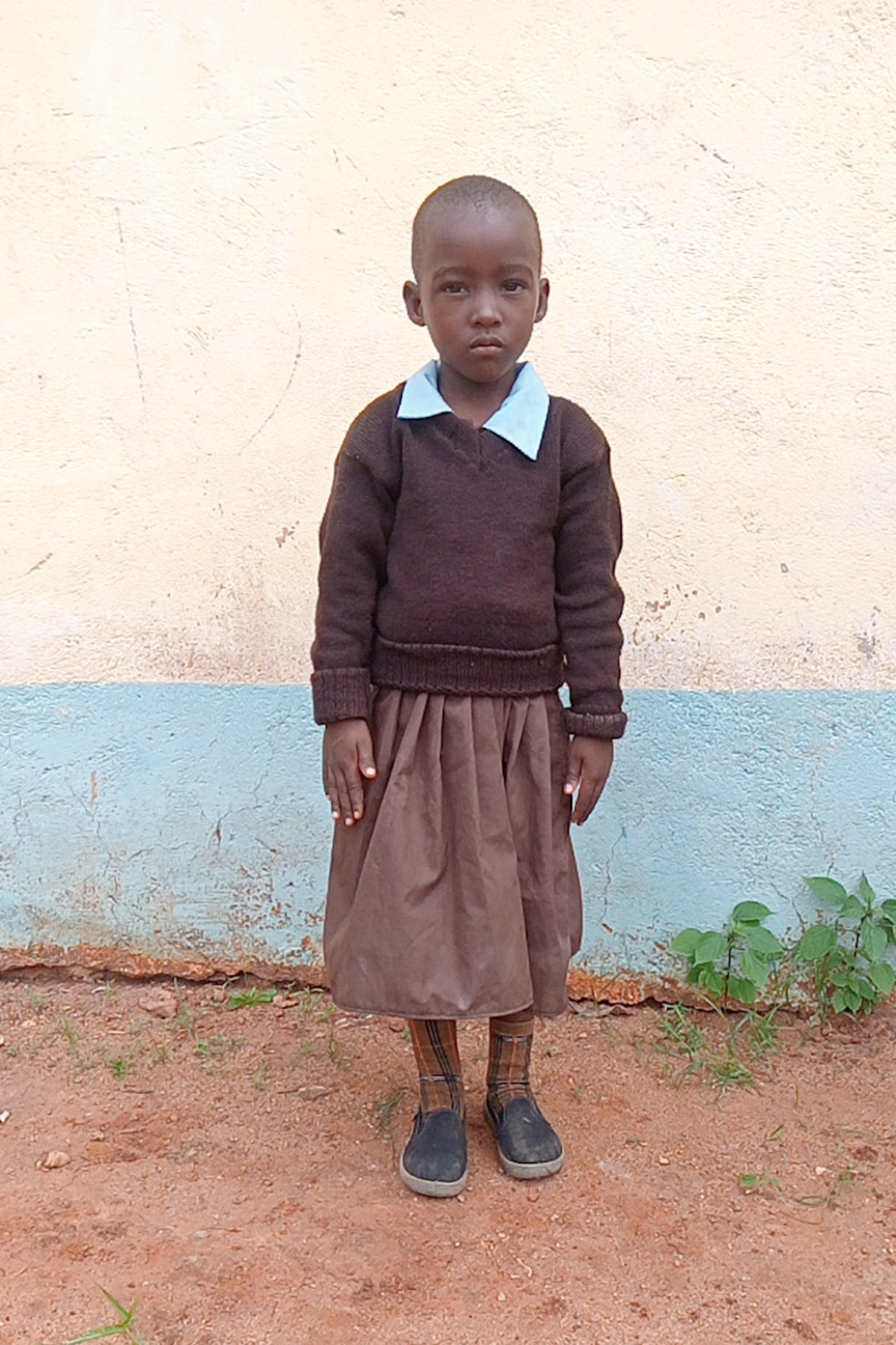 An unsponsored girl named Selah from Kenya who lives in an AIDS-affected area and has waited 477 days for a sponsor.