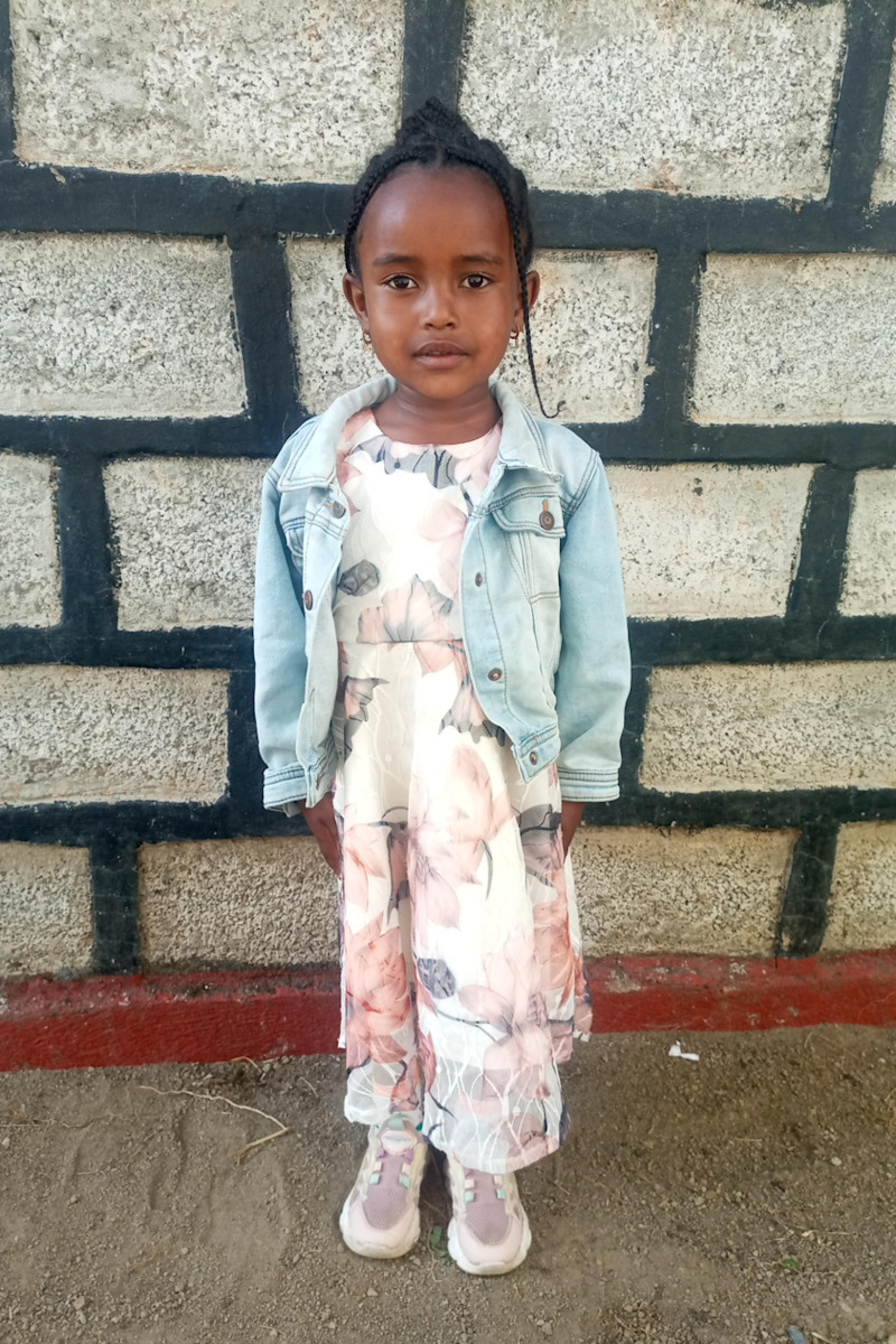 An unsponsored girl named Fiker from Ethiopia who lives in an AIDS-affected area, is vulnerable to exploitation and has waited 481 days for a sponsor.