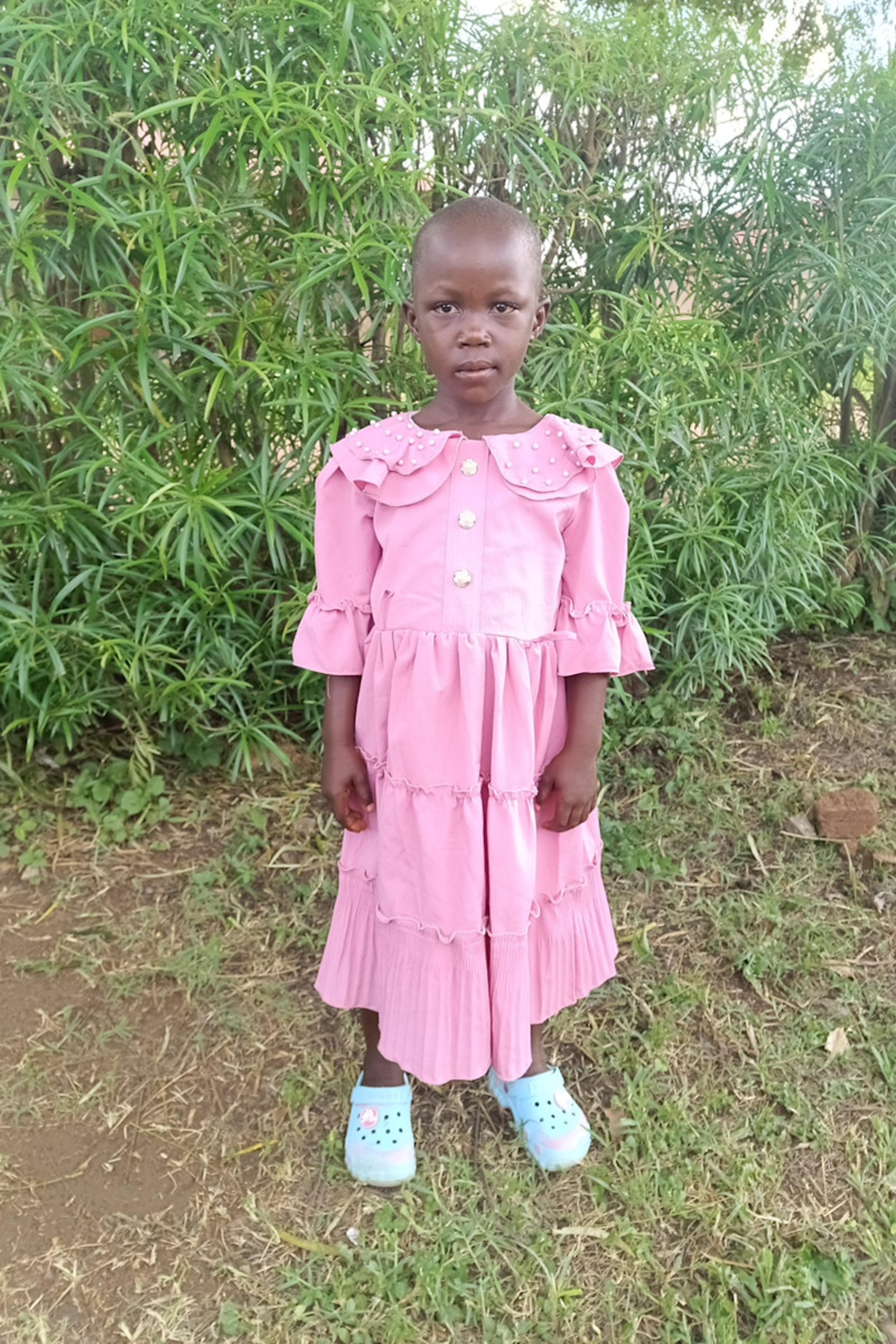 An unsponsored girl named Caroline from Uganda who lives in an AIDS-affected area, is vulnerable to exploitation and has waited 490 days for a sponsor.
