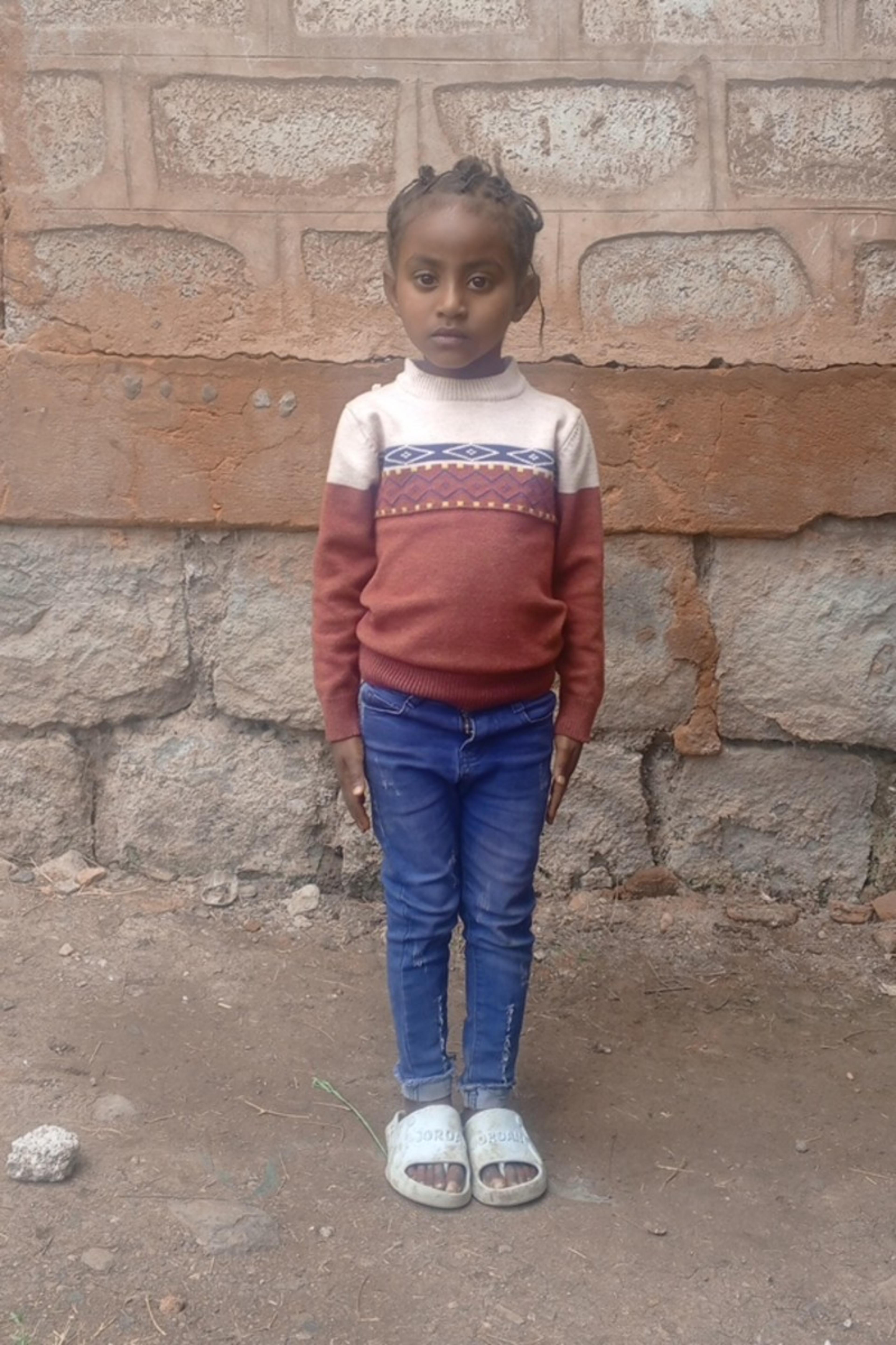 An unsponsored girl named Kena from Ethiopia who lives in an AIDS-affected area, is vulnerable to exploitation and has waited 480 days for a sponsor.