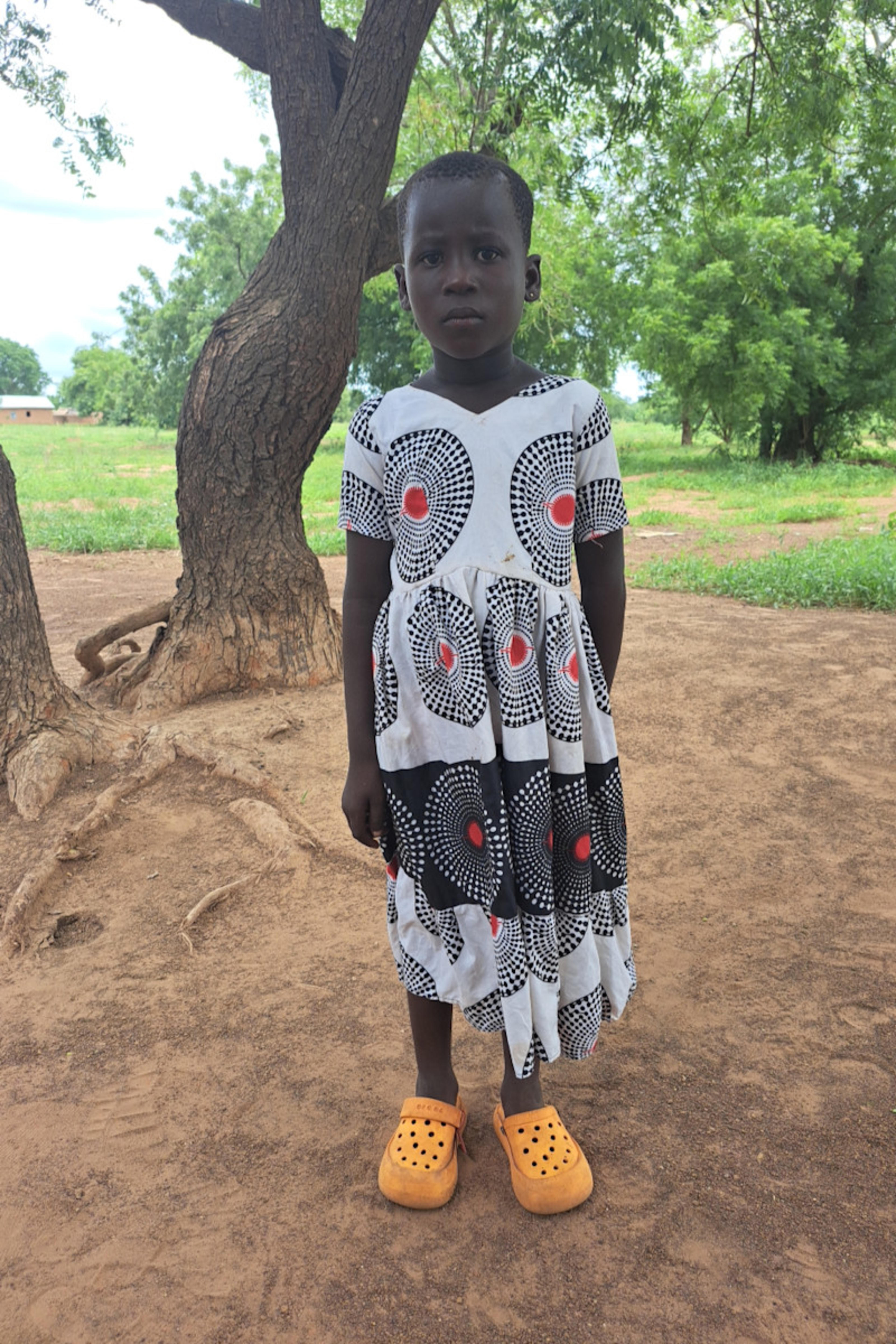 An unsponsored girl named Ponaan from Ghana who lives in an AIDS-affected area and has waited 466 days for a sponsor.