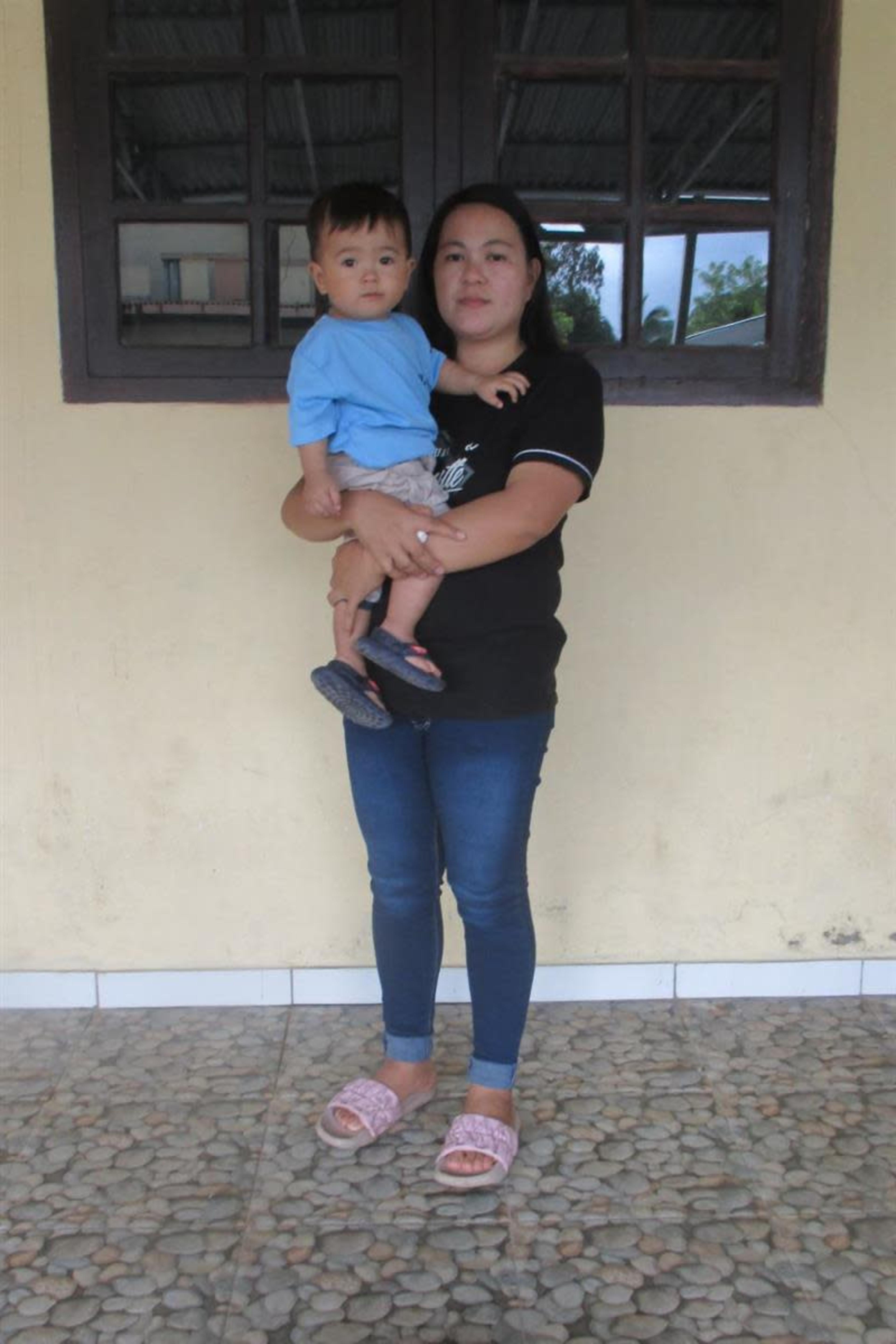 An unsponsored boy named Enzo from Indonesia who has waited 491 days for a sponsor.