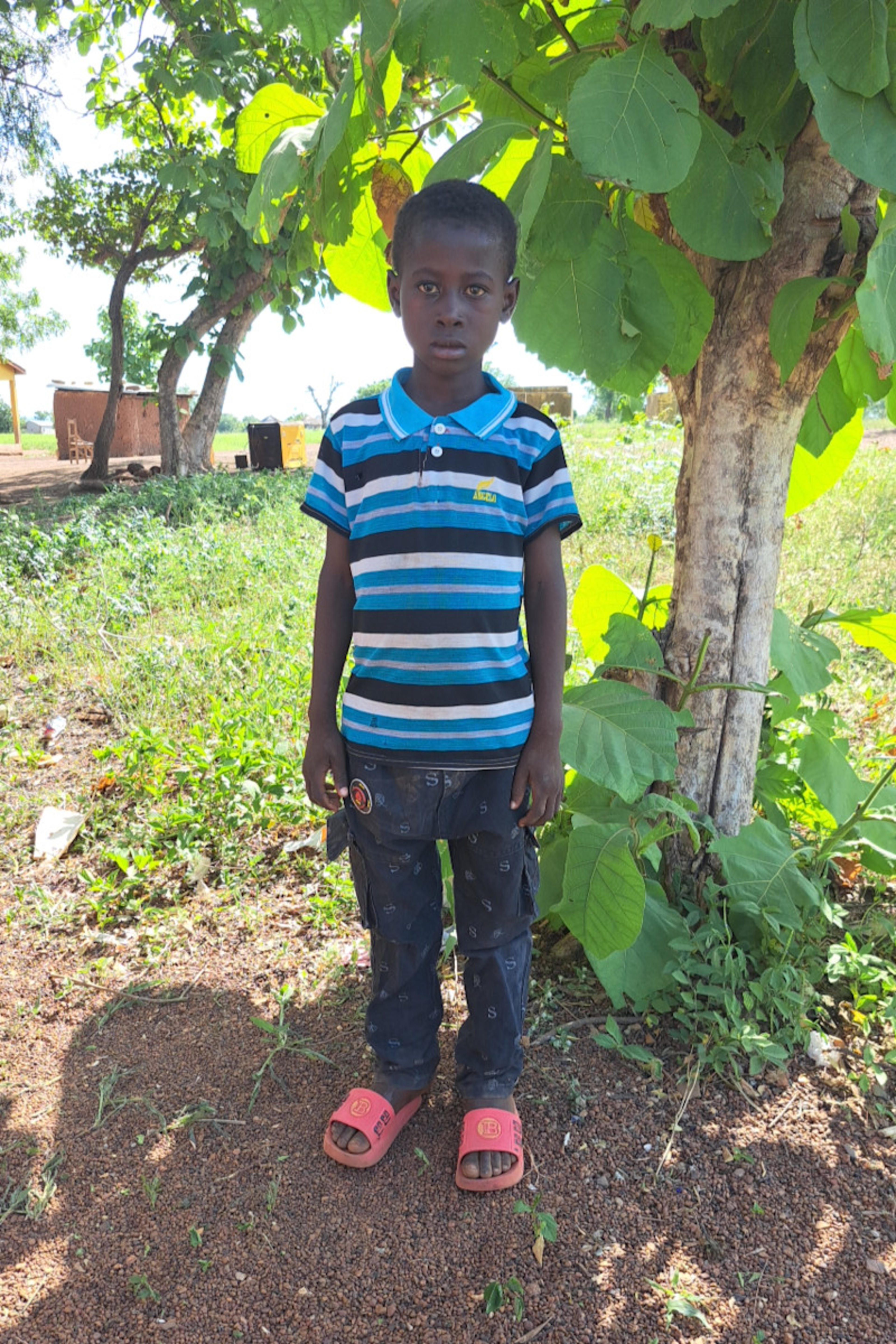An unsponsored boy named Ujormii from Ghana who lives in an AIDS-affected area and has waited 491 days for a sponsor.