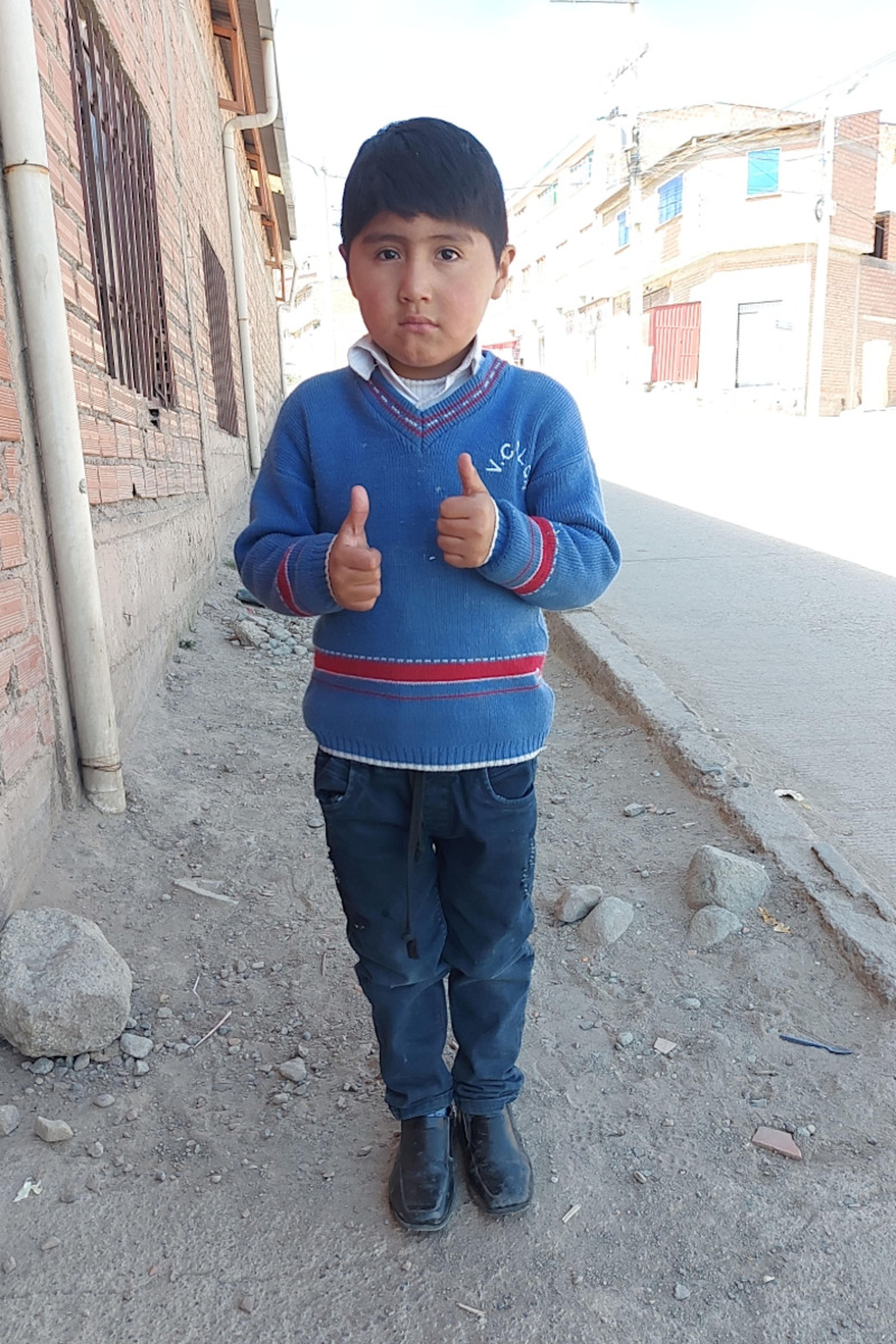 An unsponsored boy named Alex from Bolivia who has waited 462 days for a sponsor.