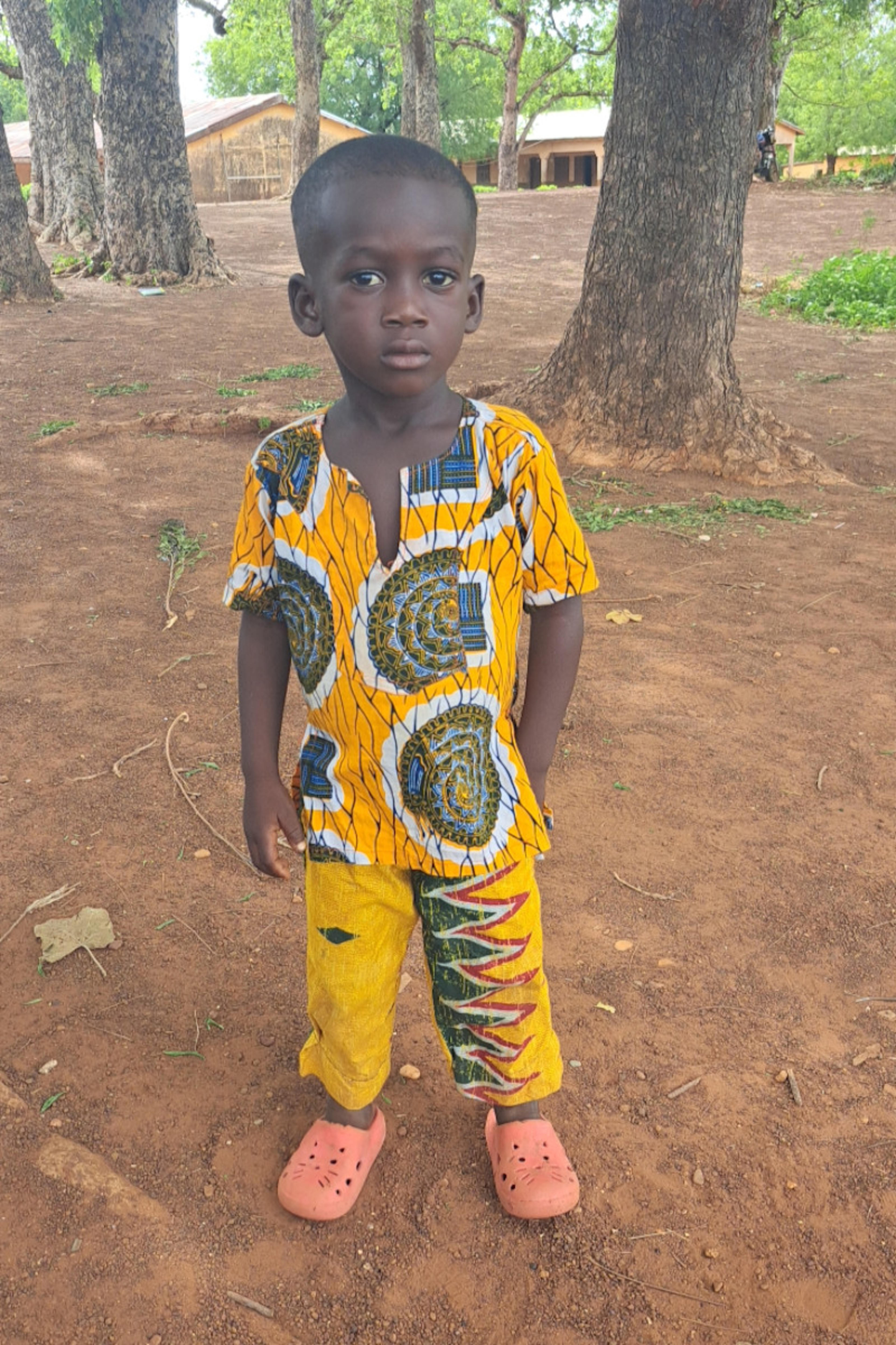 An unsponsored boy named Tinyangmache from Ghana who lives in an AIDS-affected area and has waited 482 days for a sponsor.