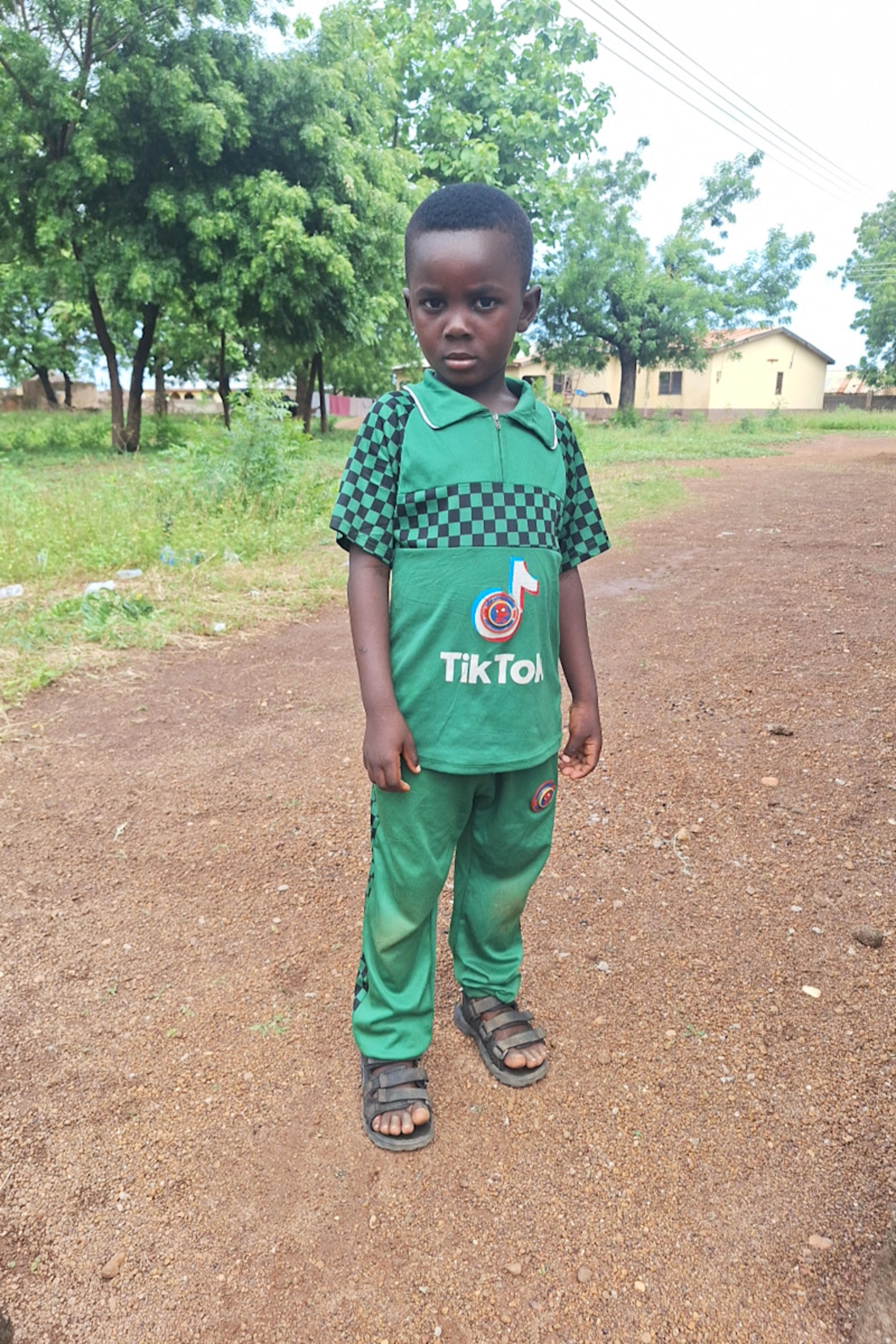 An unsponsored boy named Uwumboragntimi from Ghana who lives in an AIDS-affected area and has waited 497 days for a sponsor.