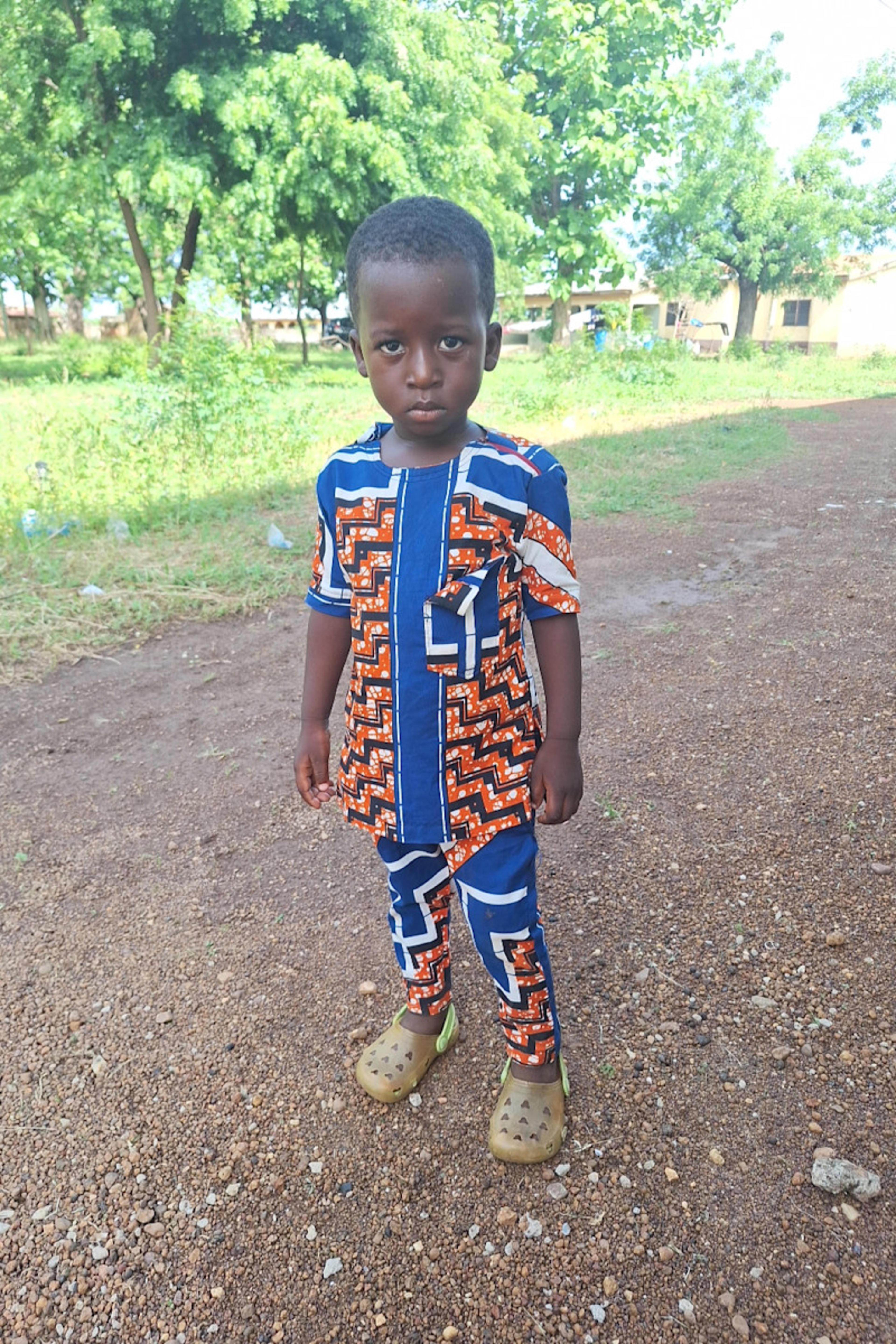 An unsponsored boy named Richard from Ghana who lives in an AIDS-affected area and has waited 449 days for a sponsor.