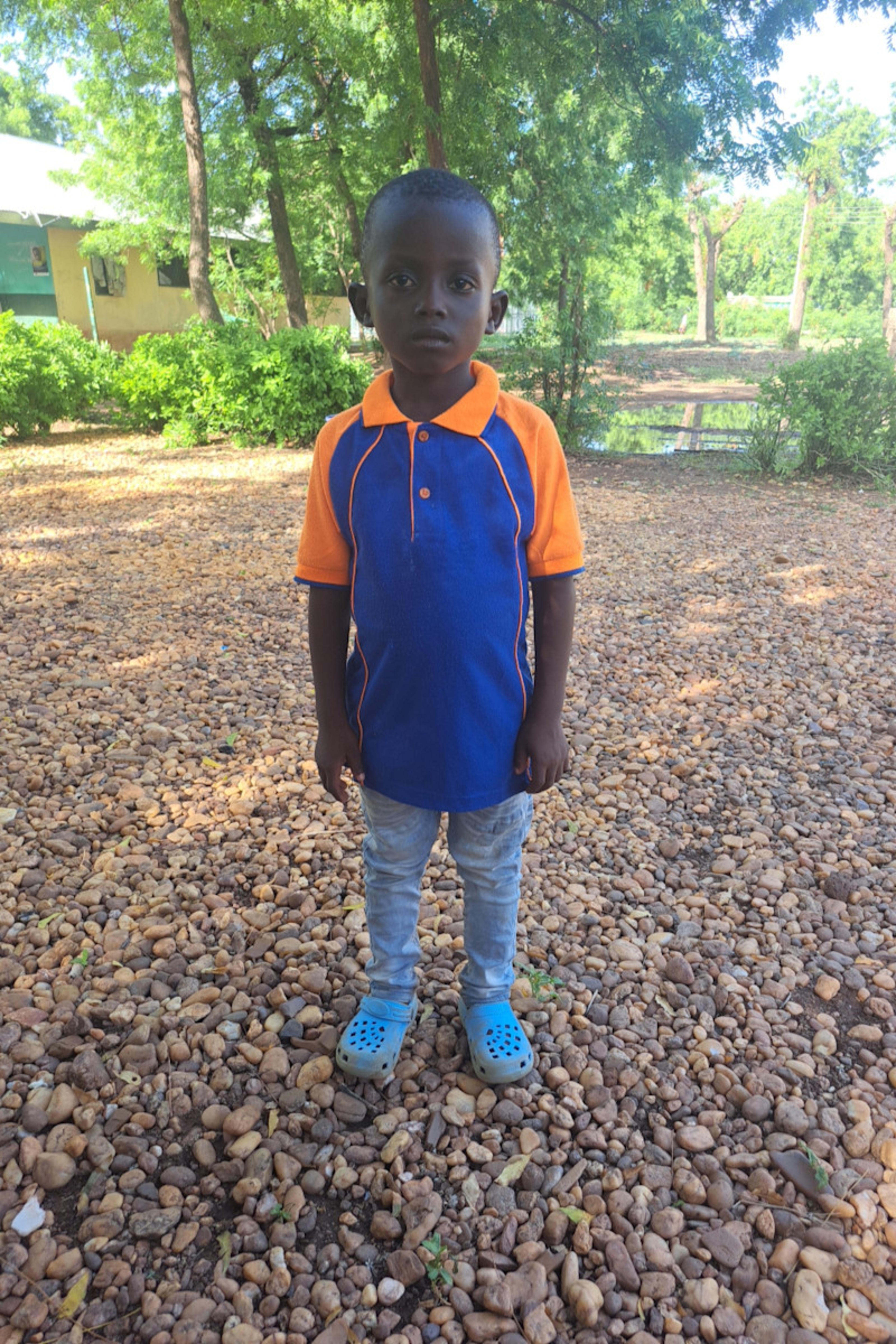 An unsponsored boy named Dennis from Ghana who lives in an AIDS-affected area and has waited 464 days for a sponsor.