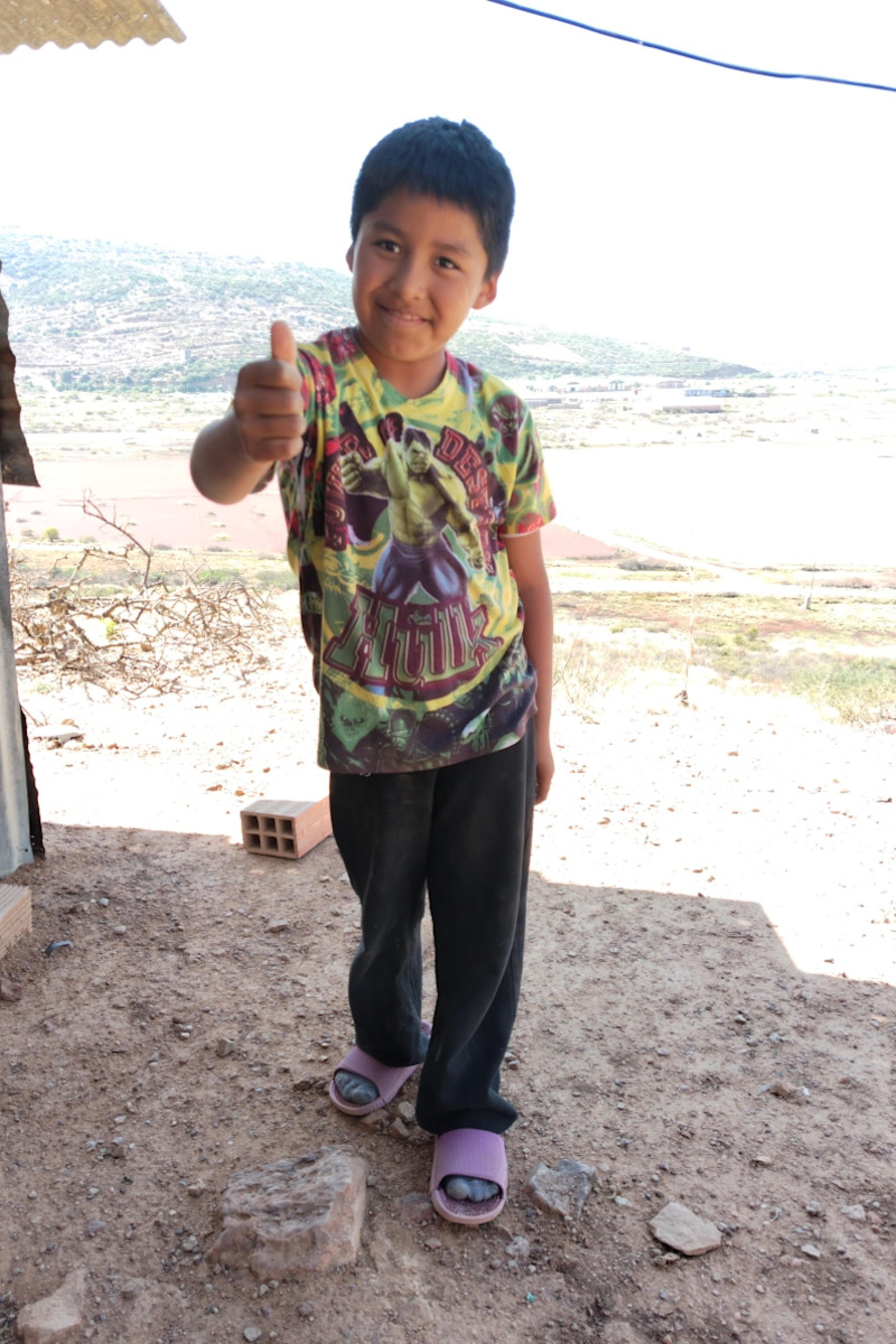 An unsponsored boy named Jhove from Bolivia who has waited 468 days for a sponsor.
