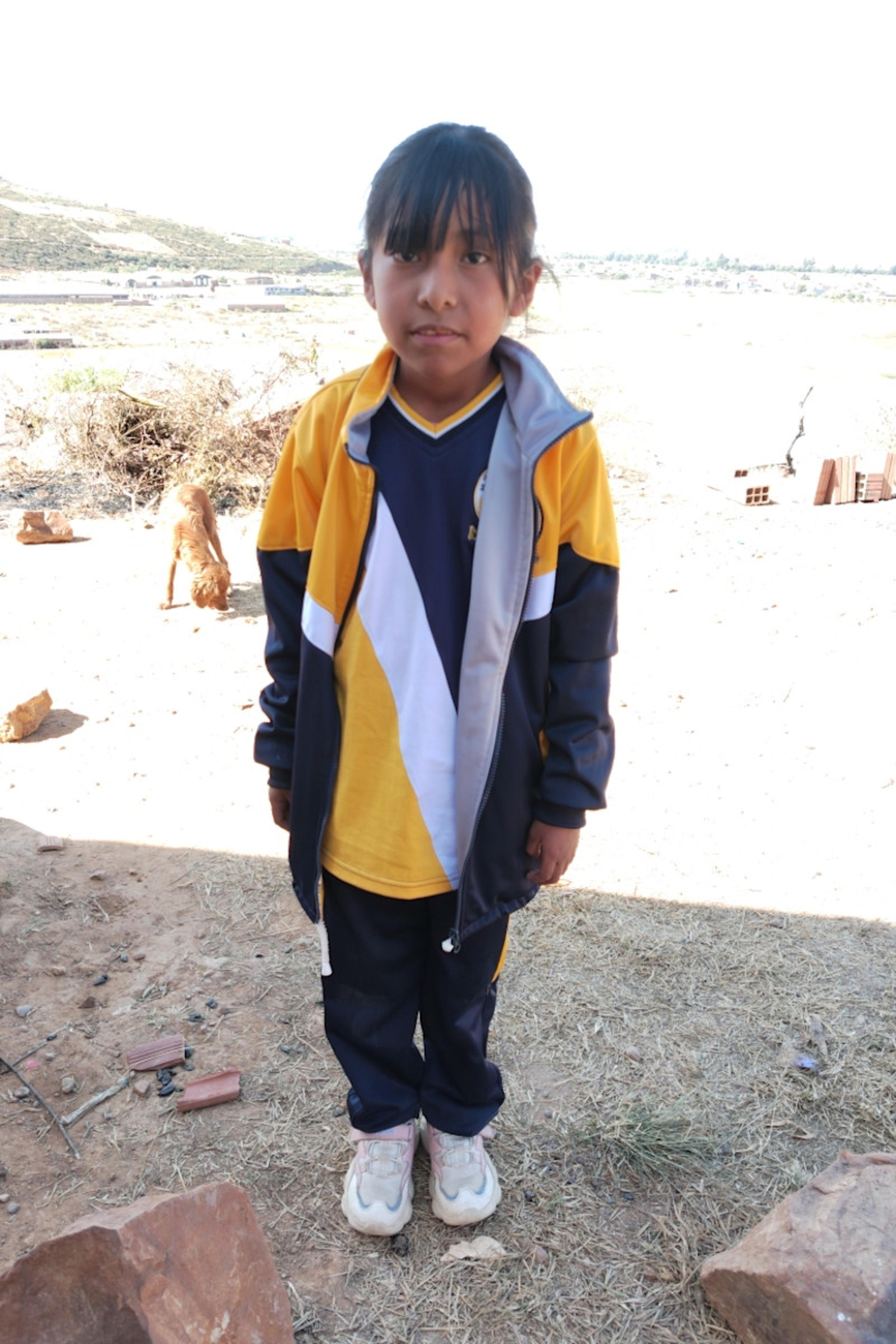 An unsponsored girl named Jhomara from Bolivia who has waited 468 days for a sponsor.