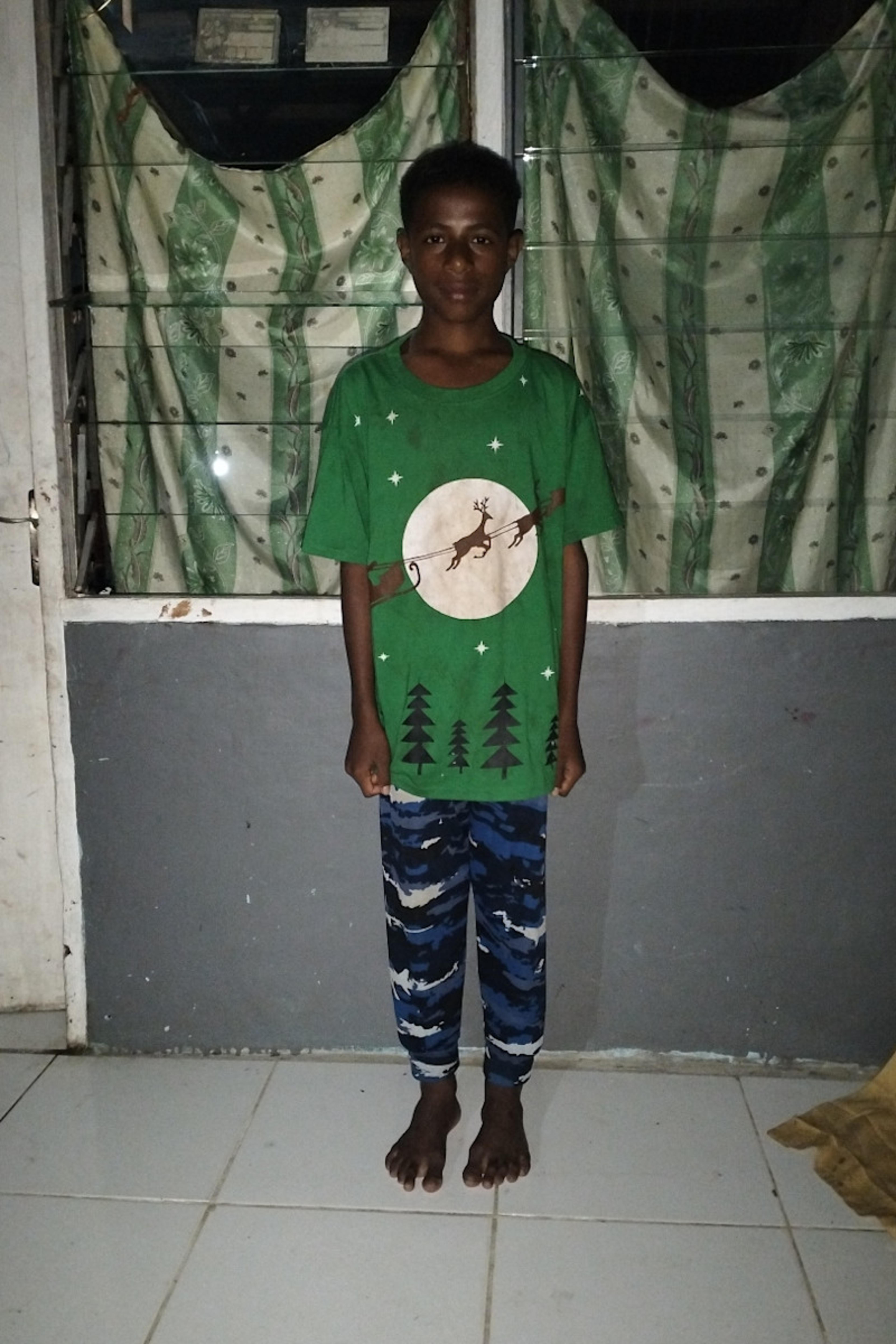 An unsponsored boy named Didi from Indonesia who has waited 504 days for a sponsor.