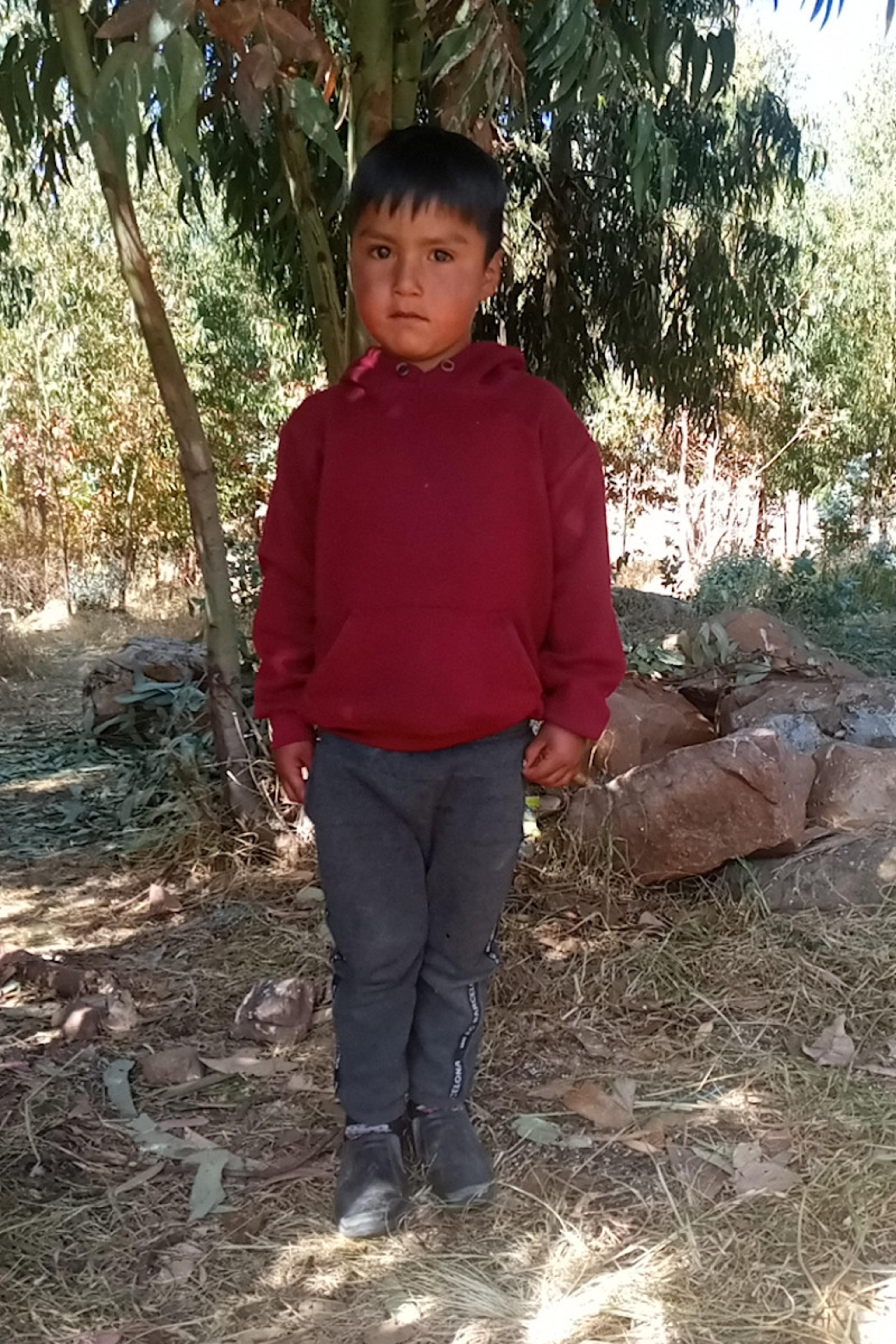 An unsponsored boy named Emirson from Bolivia who has waited 466 days for a sponsor.