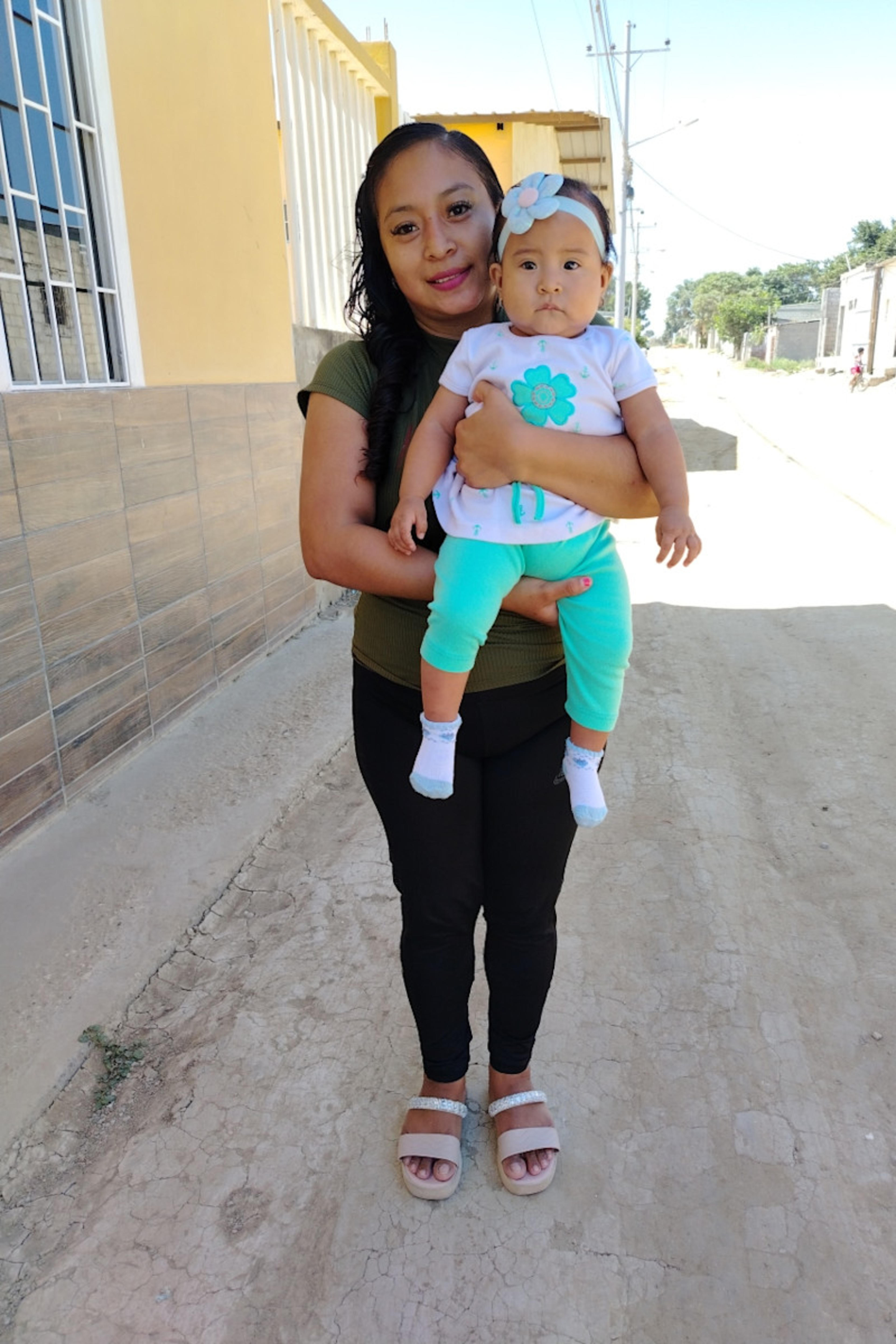 An unsponsored girl named Emily from Ecuador who has waited 445 days for a sponsor.