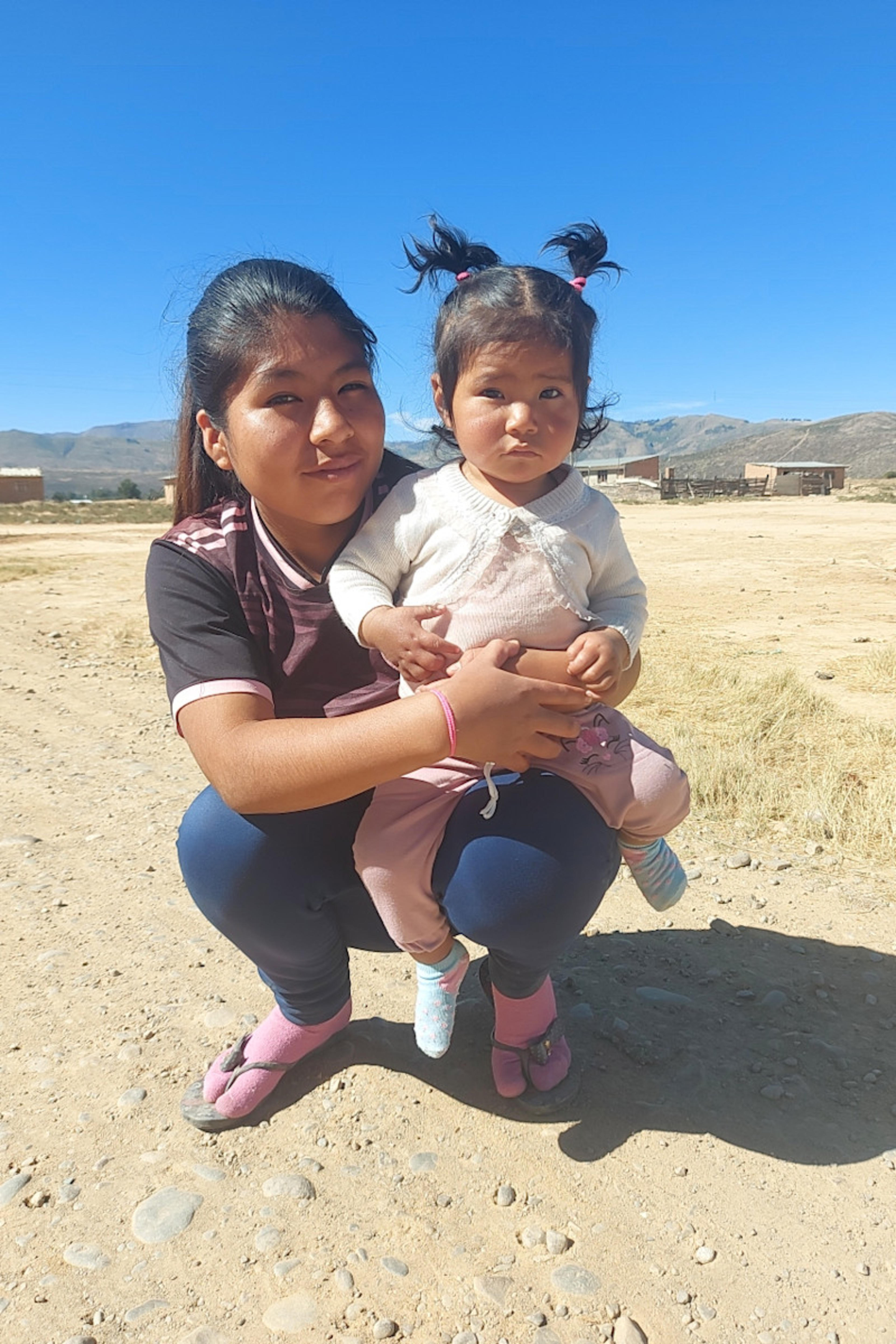 An unsponsored girl named Flor from Bolivia who has waited 432 days for a sponsor.