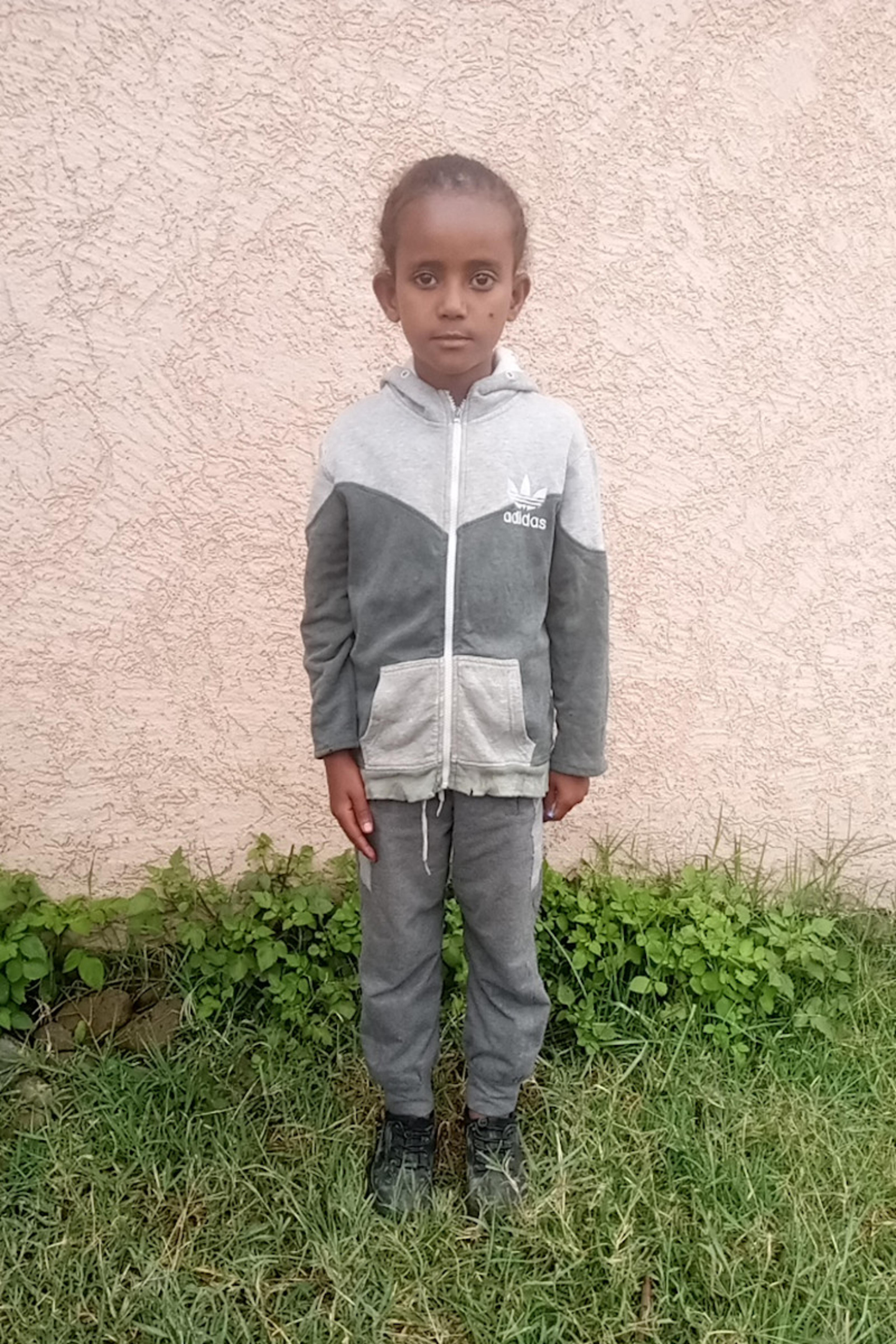 An unsponsored girl named Dinkeneshi from Ethiopia who lives in an AIDS-affected area, is vulnerable to exploitation and has waited 391 days for a sponsor.