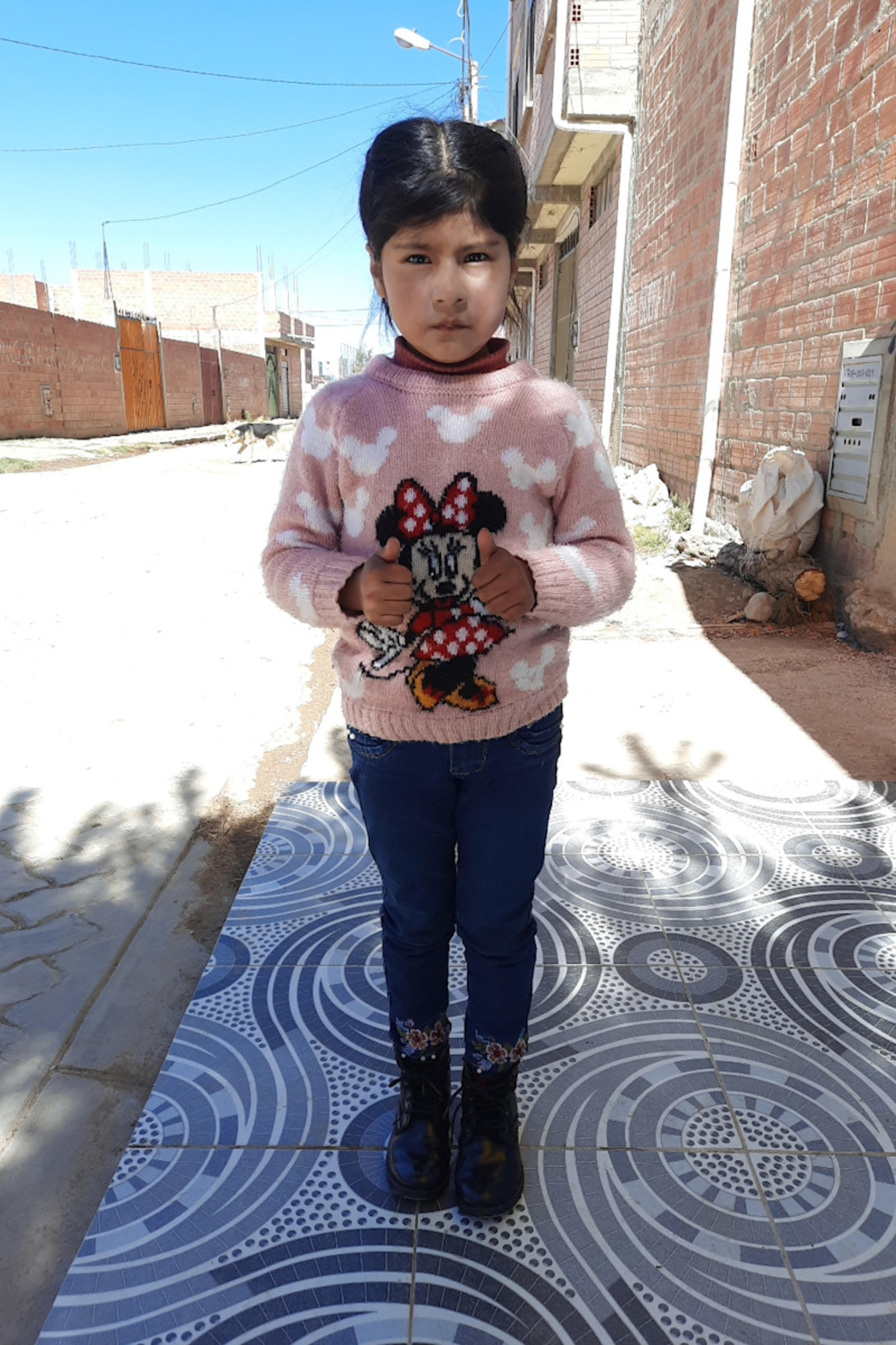 An unsponsored girl named Melany from Bolivia who has waited 469 days for a sponsor.