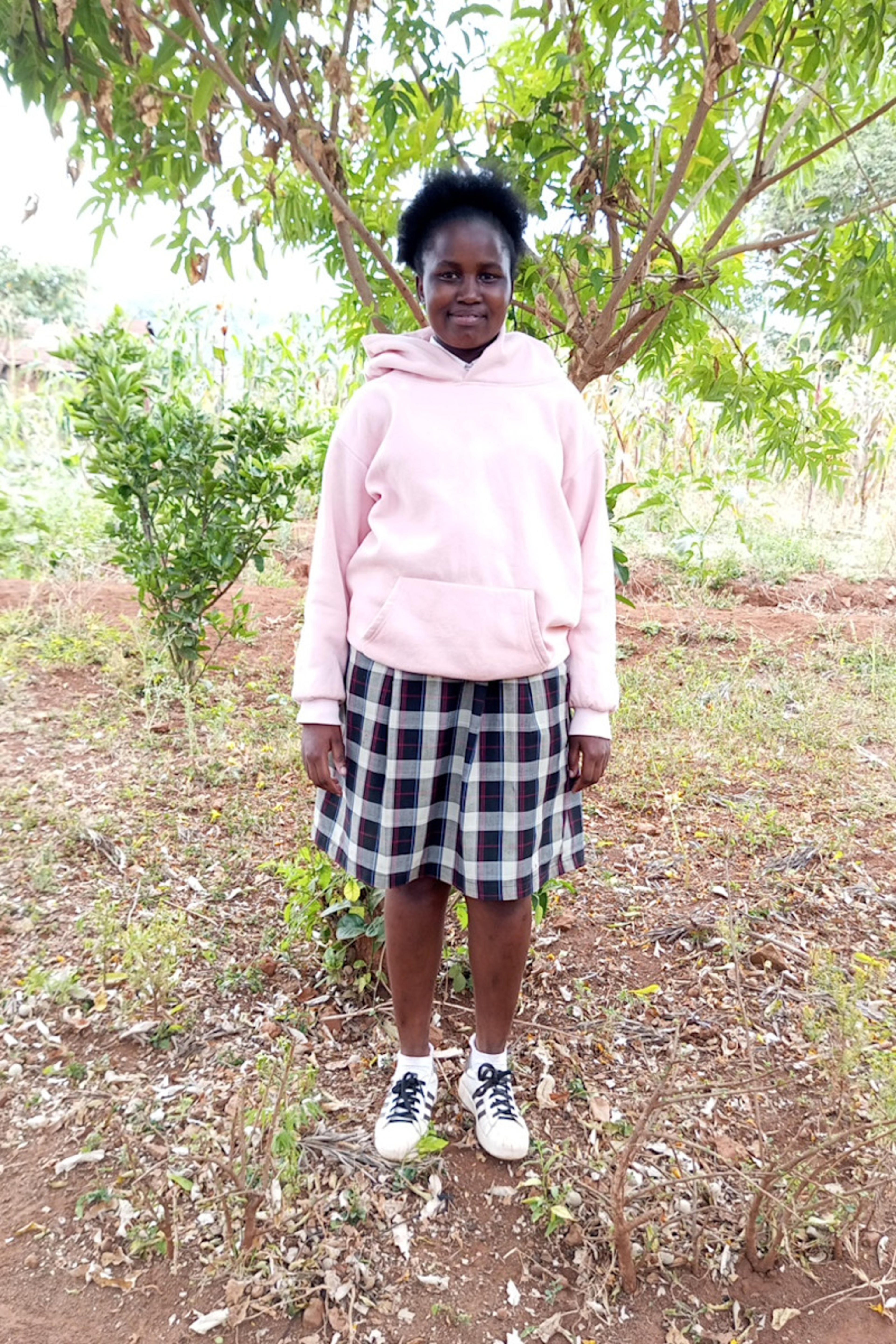An unsponsored girl named Jackline from Kenya who lives in an AIDS-affected area and has waited 540 days for a sponsor.
