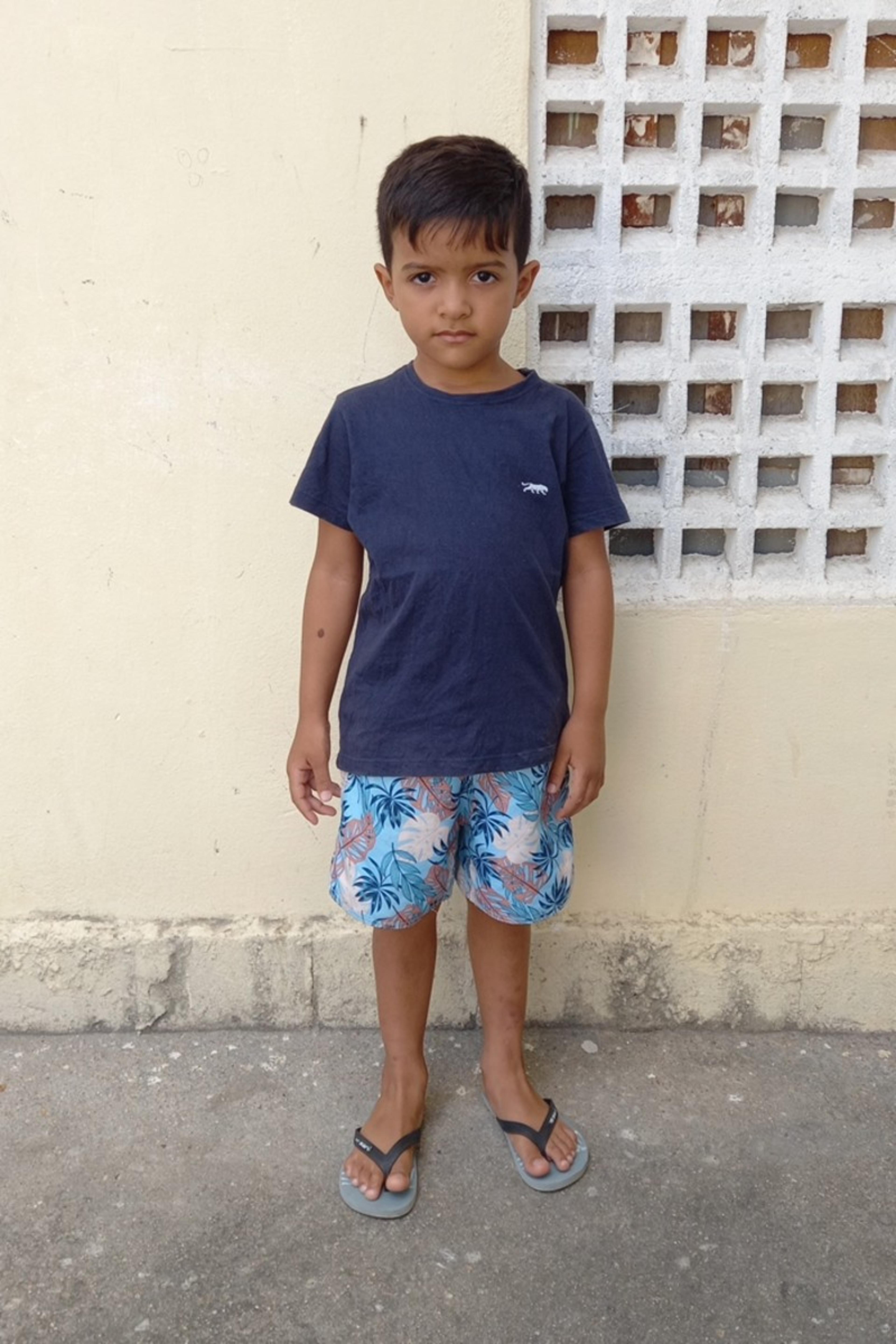 An unsponsored boy named Josué from Brazil who has waited 418 days for a sponsor.