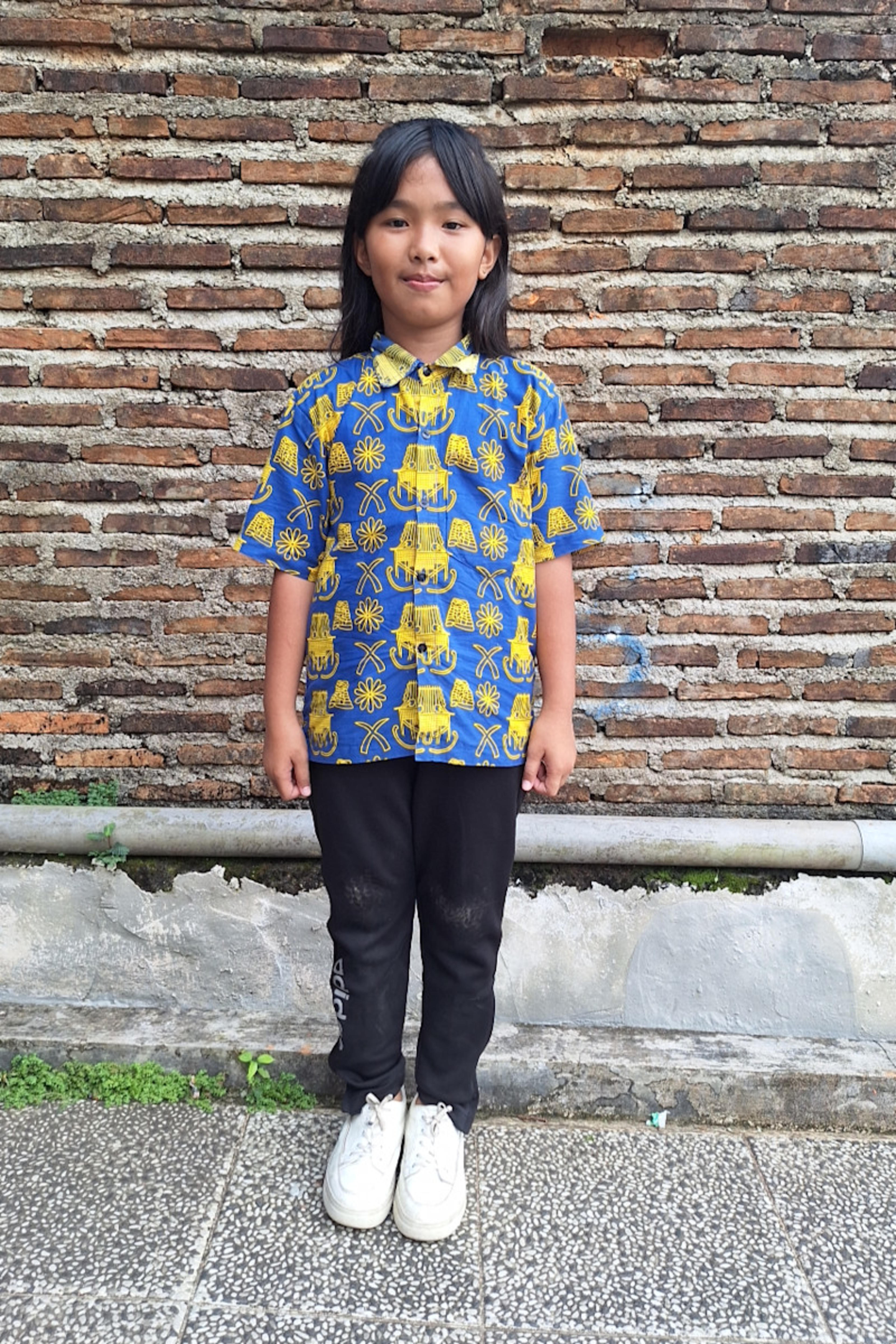 An unsponsored girl named Clairin from Indonesia who has waited 514 days for a sponsor.