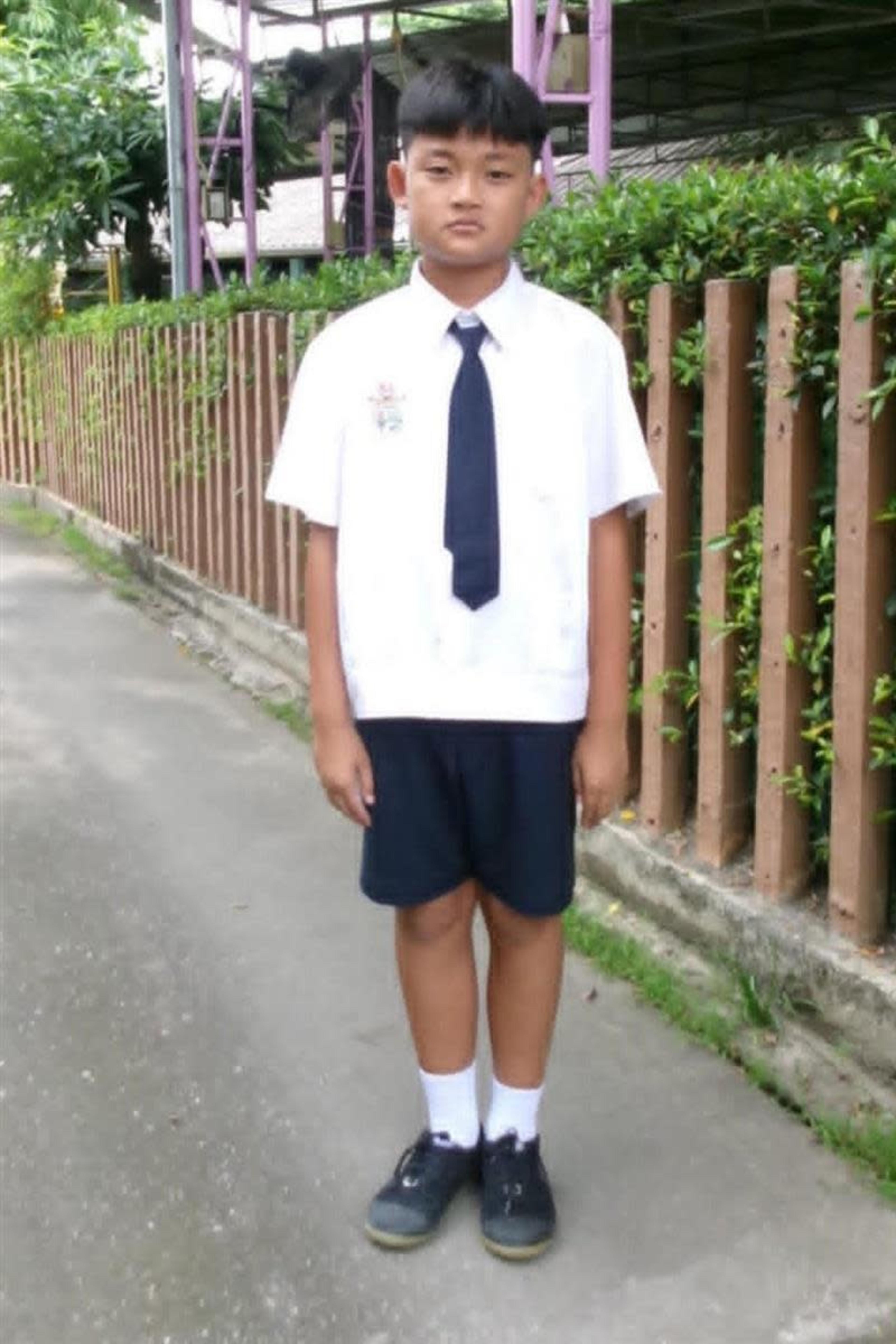 An unsponsored boy named Newton from Thailand who has waited 578 days for a sponsor.