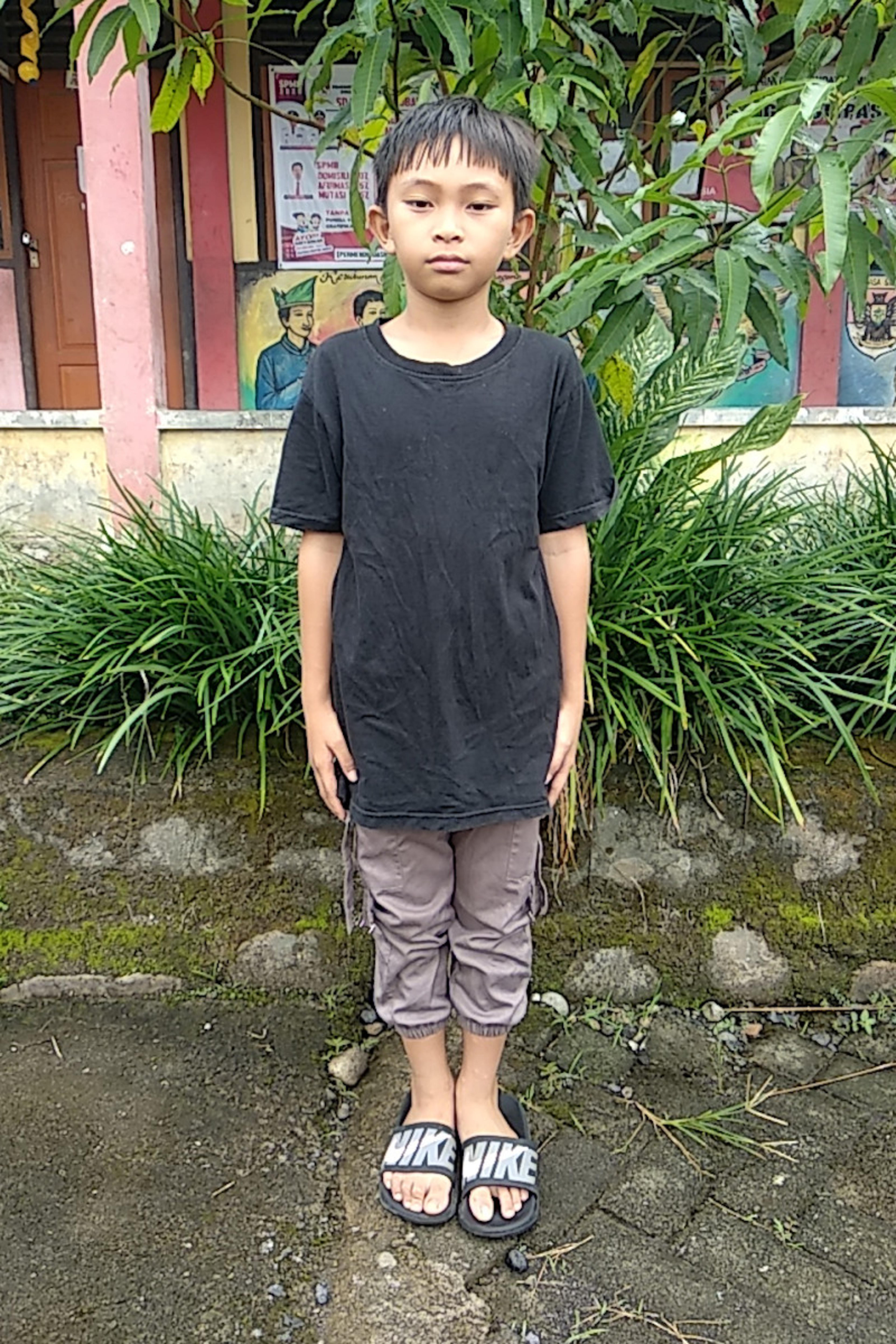 An unsponsored boy named Lio from Indonesia who has waited 326 days for a sponsor.