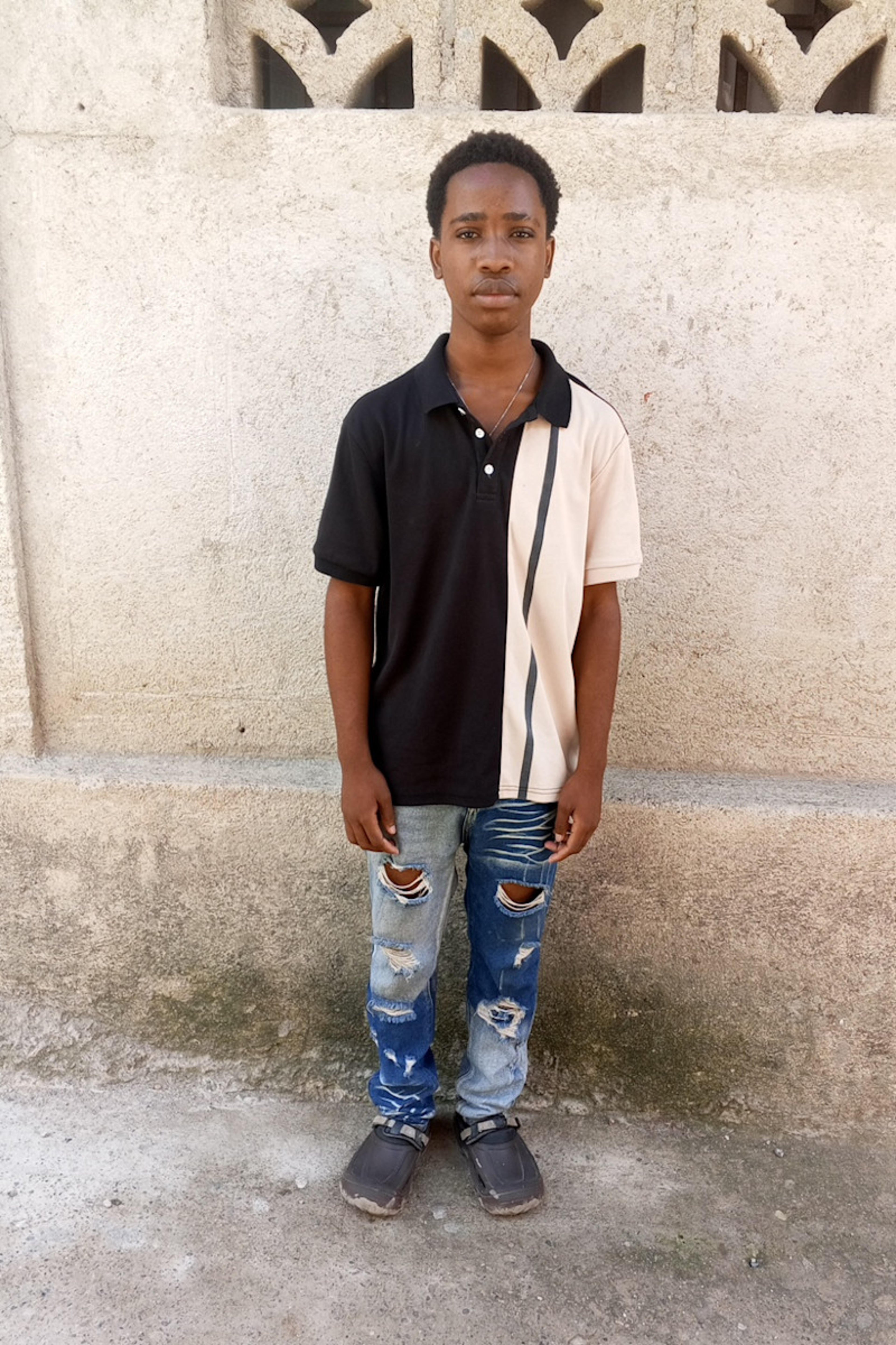 An unsponsored boy named Spender from Haiti who is vulnerable to exploitation and has waited 561 days for a sponsor.