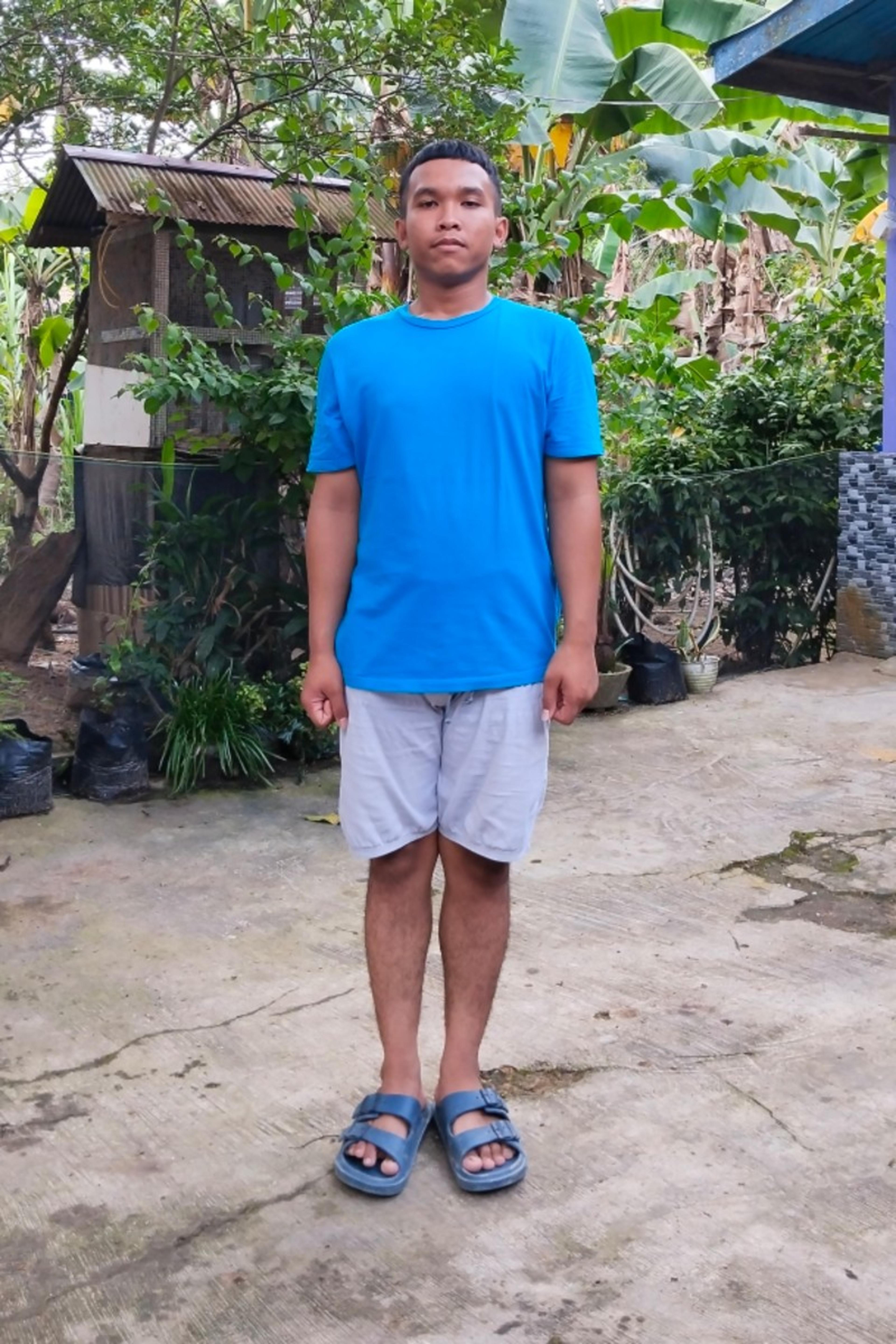 An unsponsored boy named Chris from Indonesia who has waited 527 days for a sponsor.