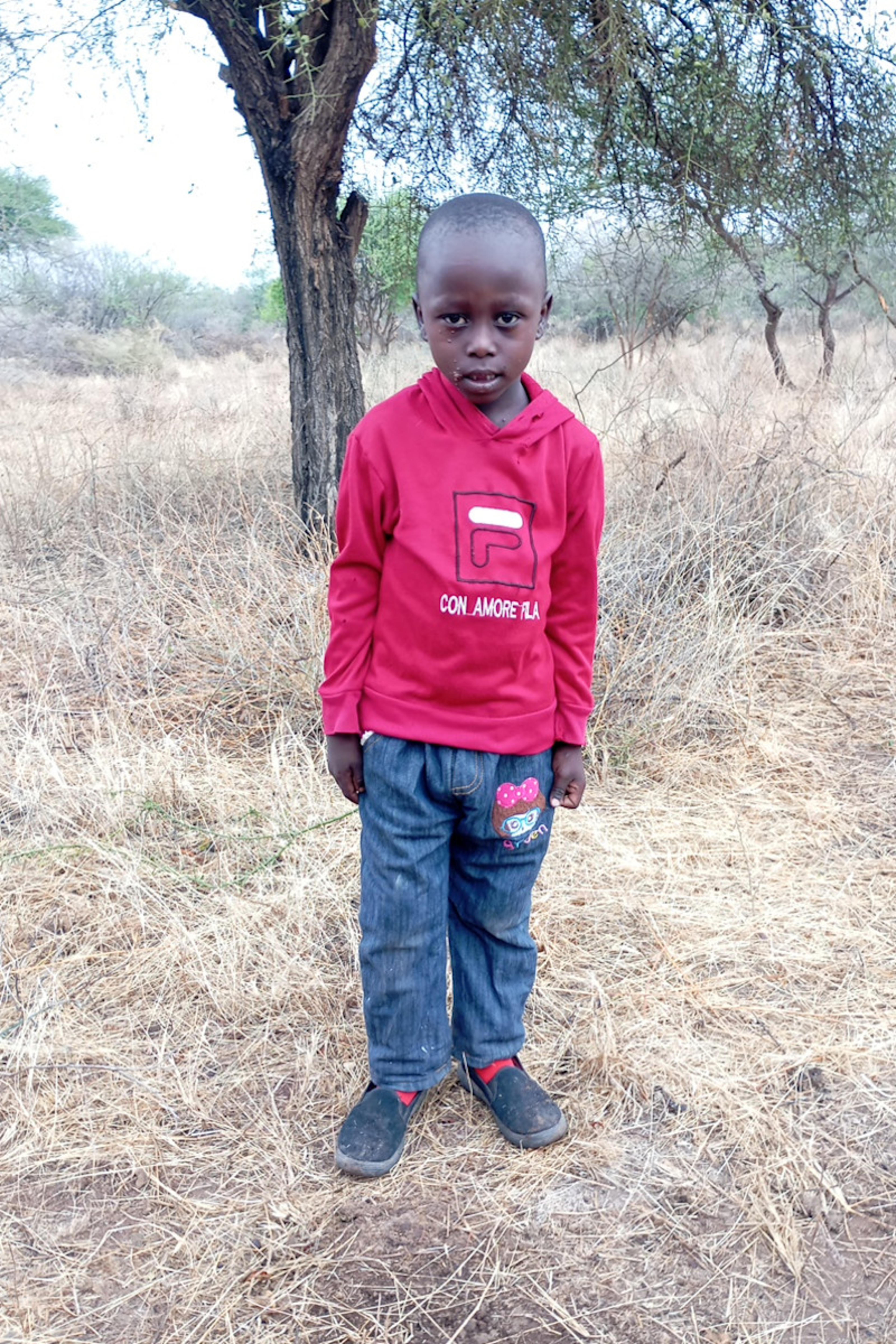 An unsponsored boy named Moses from Kenya who lives in an AIDS-affected area and has waited 335 days for a sponsor.