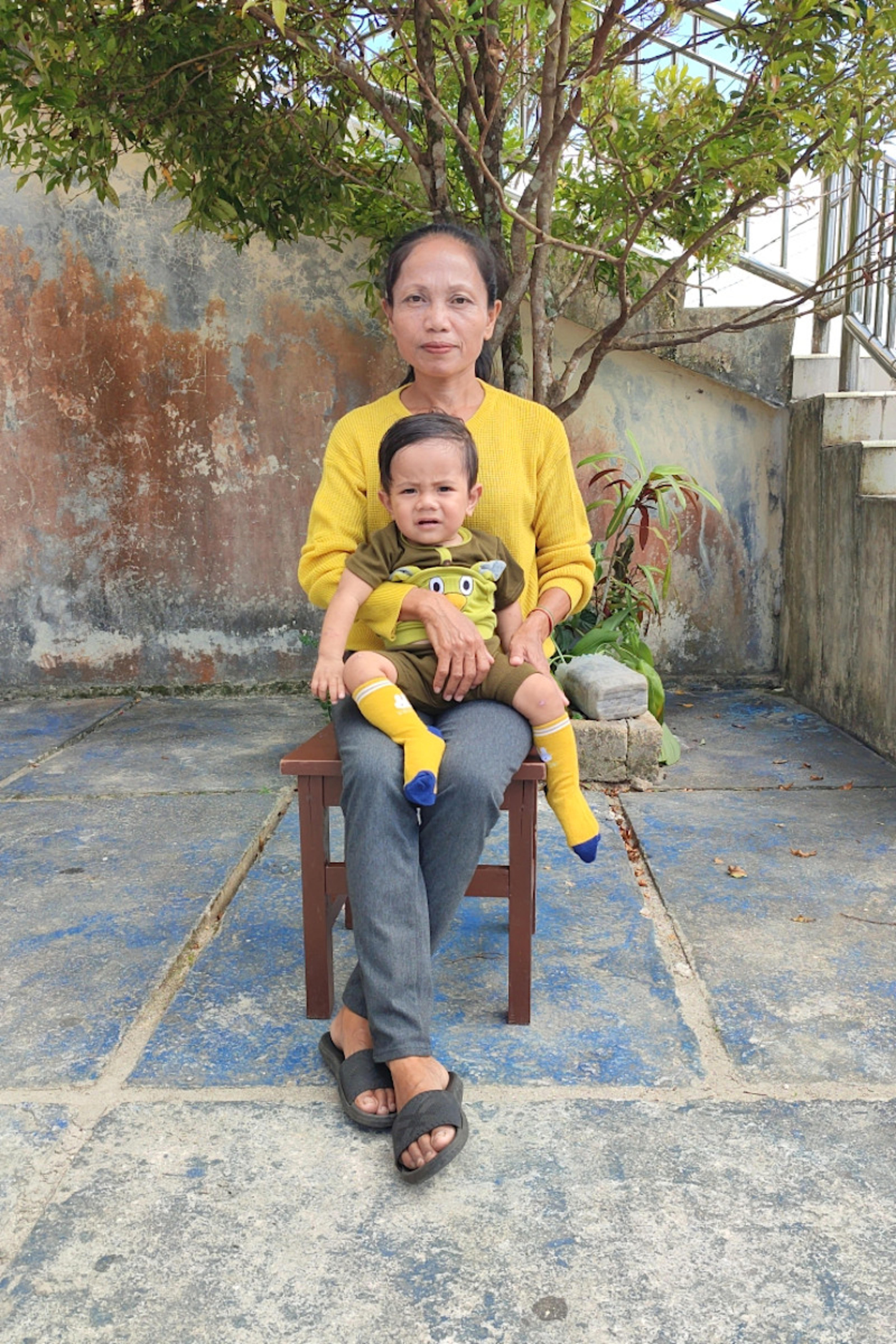 An unsponsored boy named Elkana from Indonesia who has waited 334 days for a sponsor.