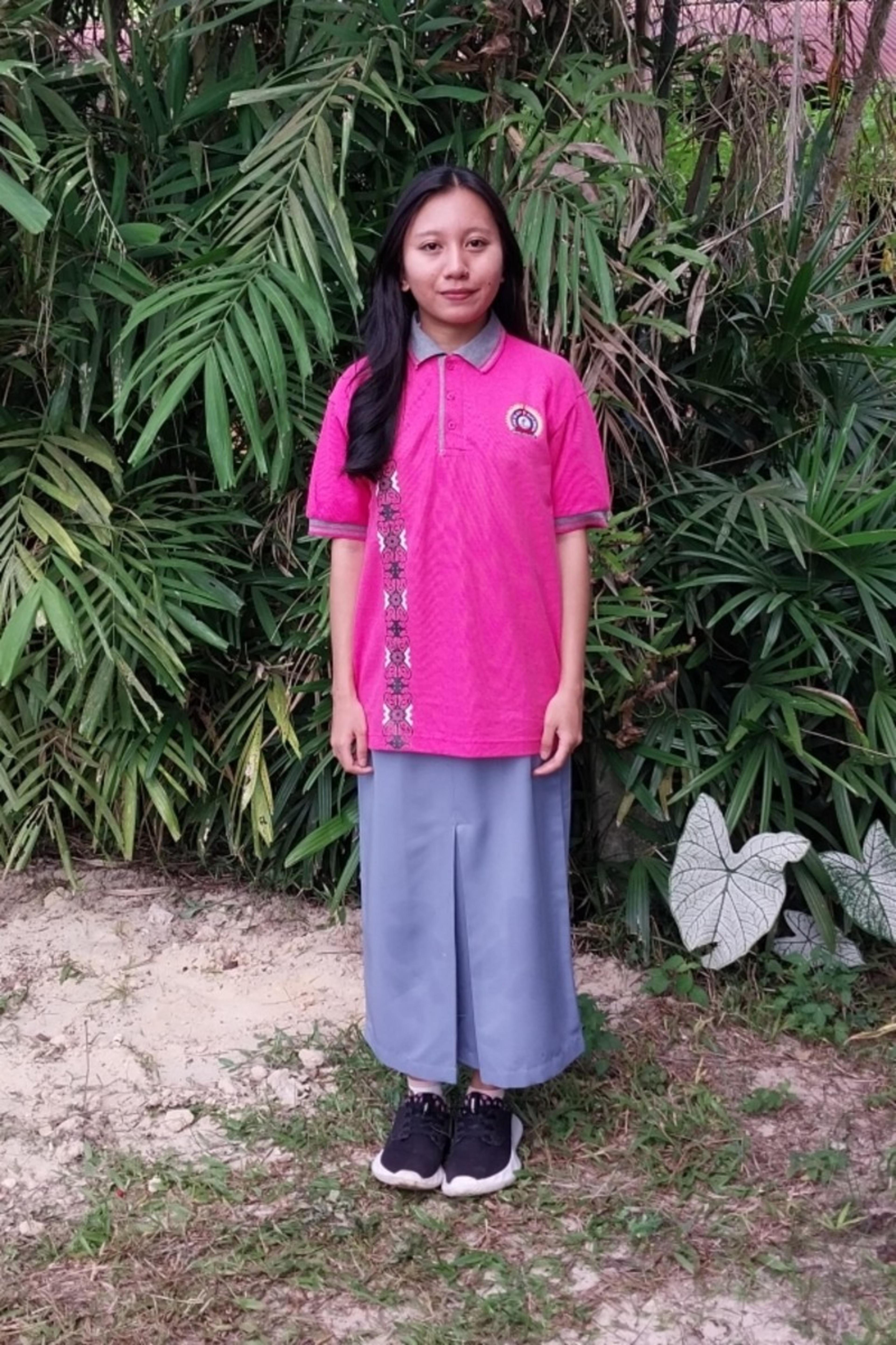 An unsponsored girl named Denisa from Indonesia who has waited 230 days for a sponsor.