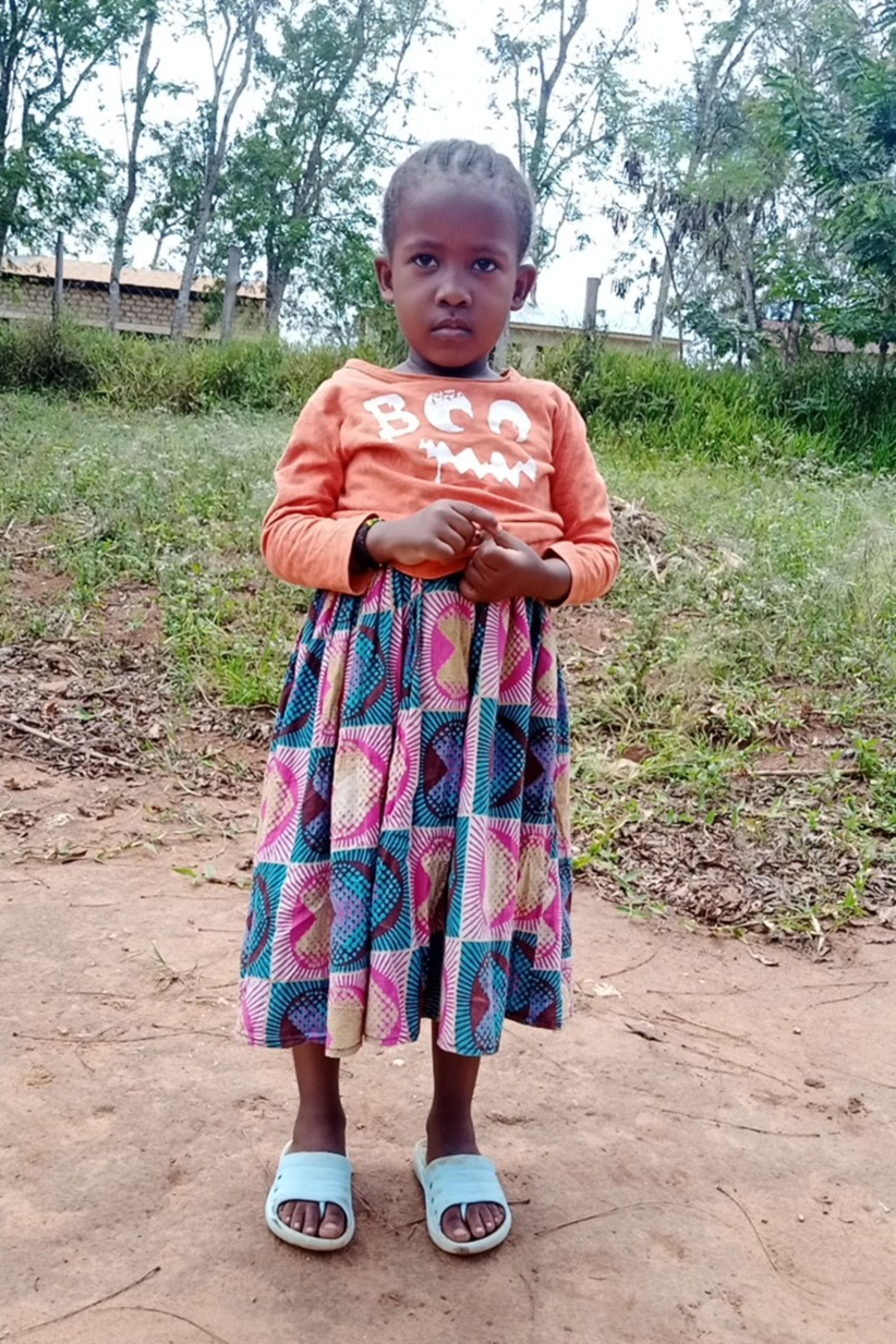 An unsponsored girl named Kedi from Kenya who lives in an AIDS-affected area and has waited 326 days for a sponsor.