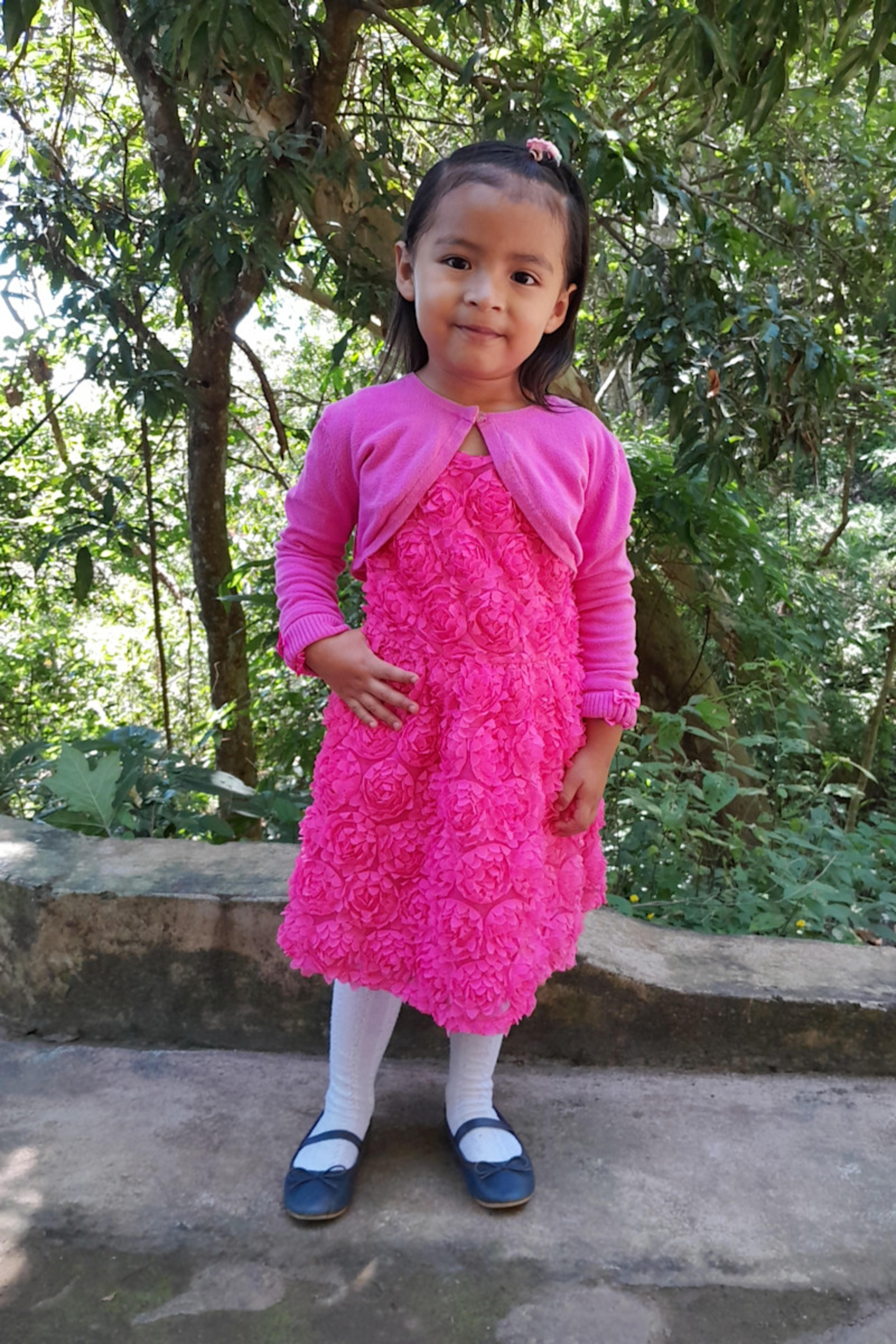 An unsponsored girl named Yesimiel from El Salvador who has waited 383 days for a sponsor.