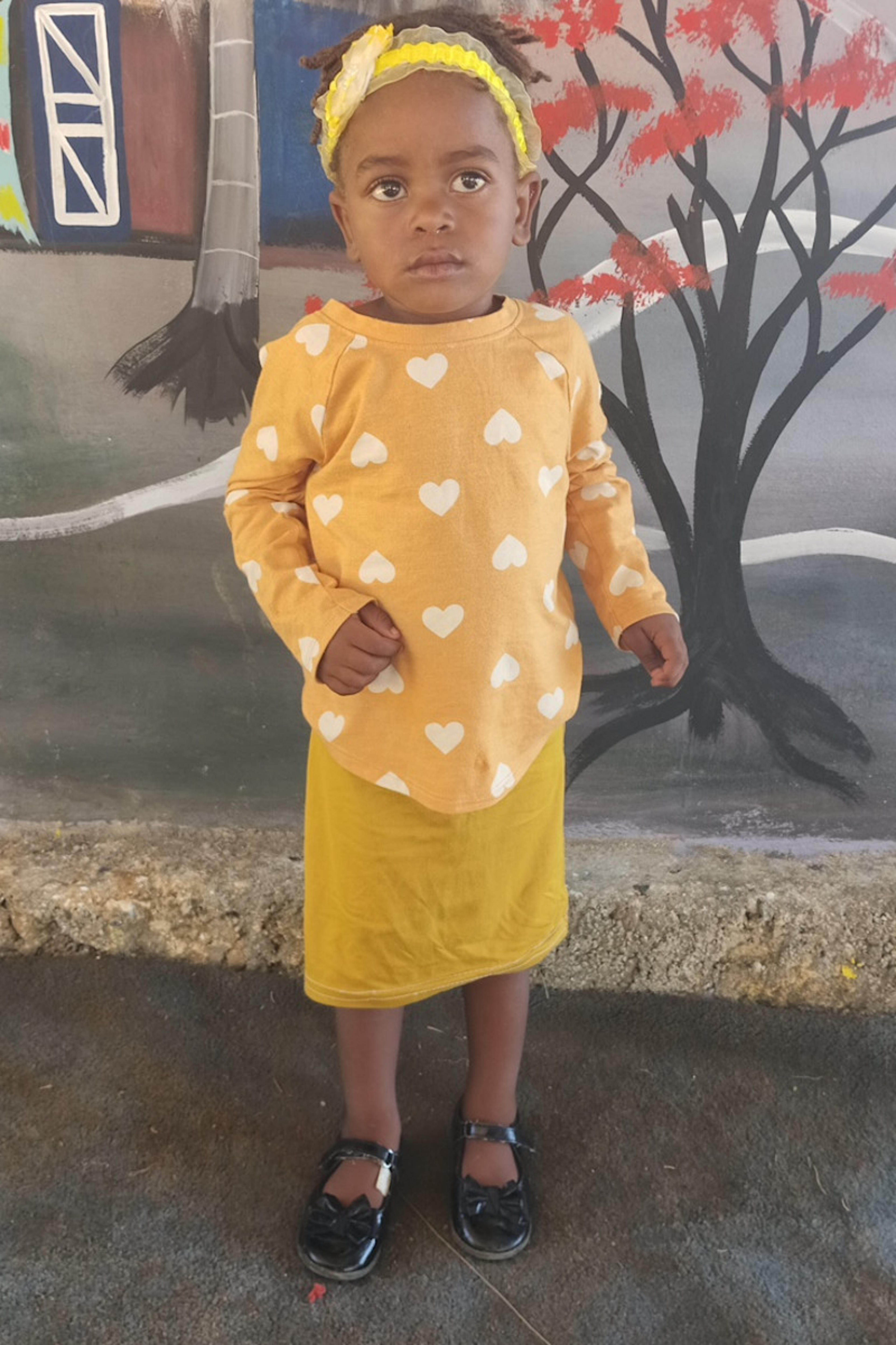 An unsponsored girl named Odeline from Haiti who is vulnerable to exploitation and has waited 343 days for a sponsor.