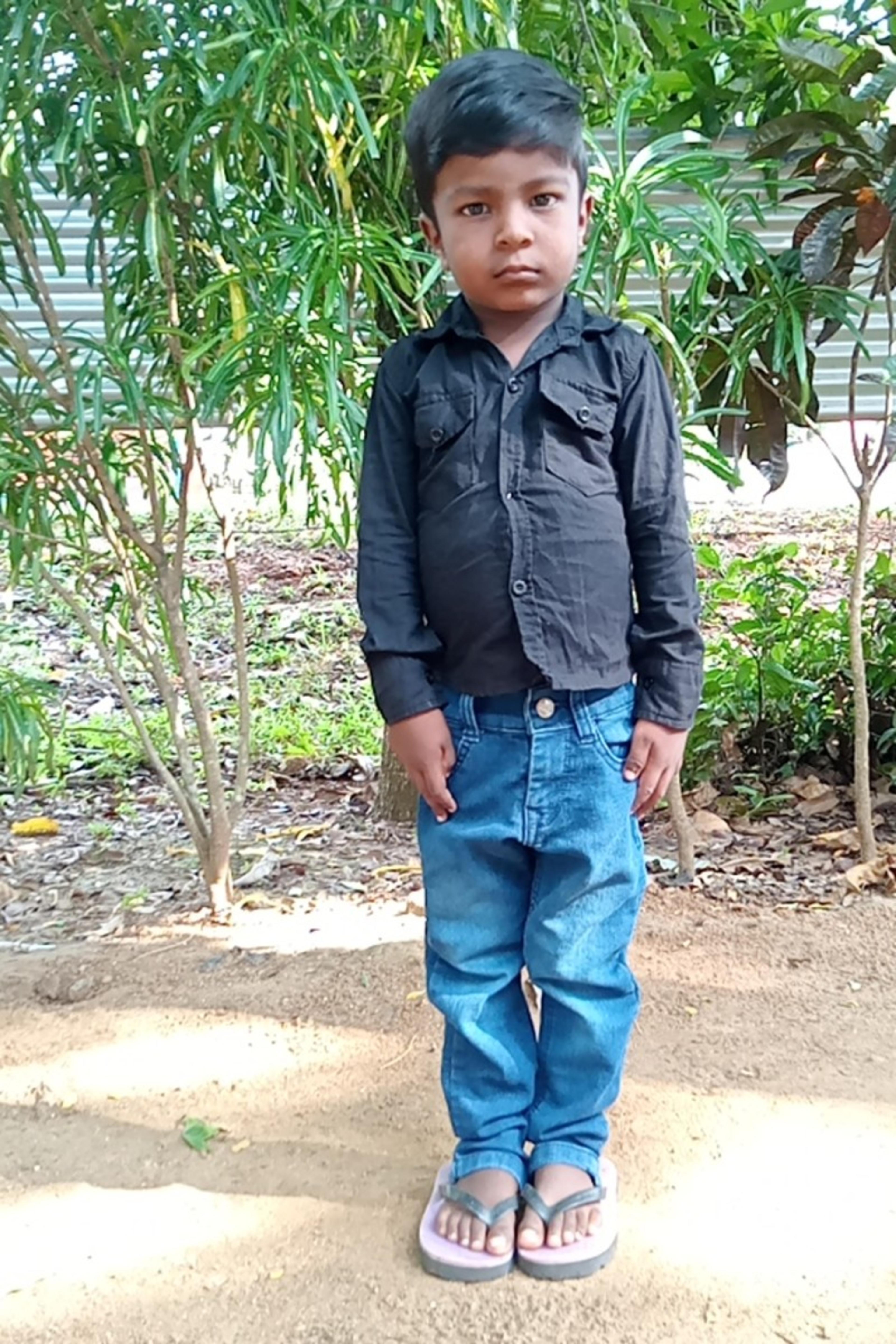 An unsponsored boy named Thachchu from Sri Lanka who has waited 459 days for a sponsor.