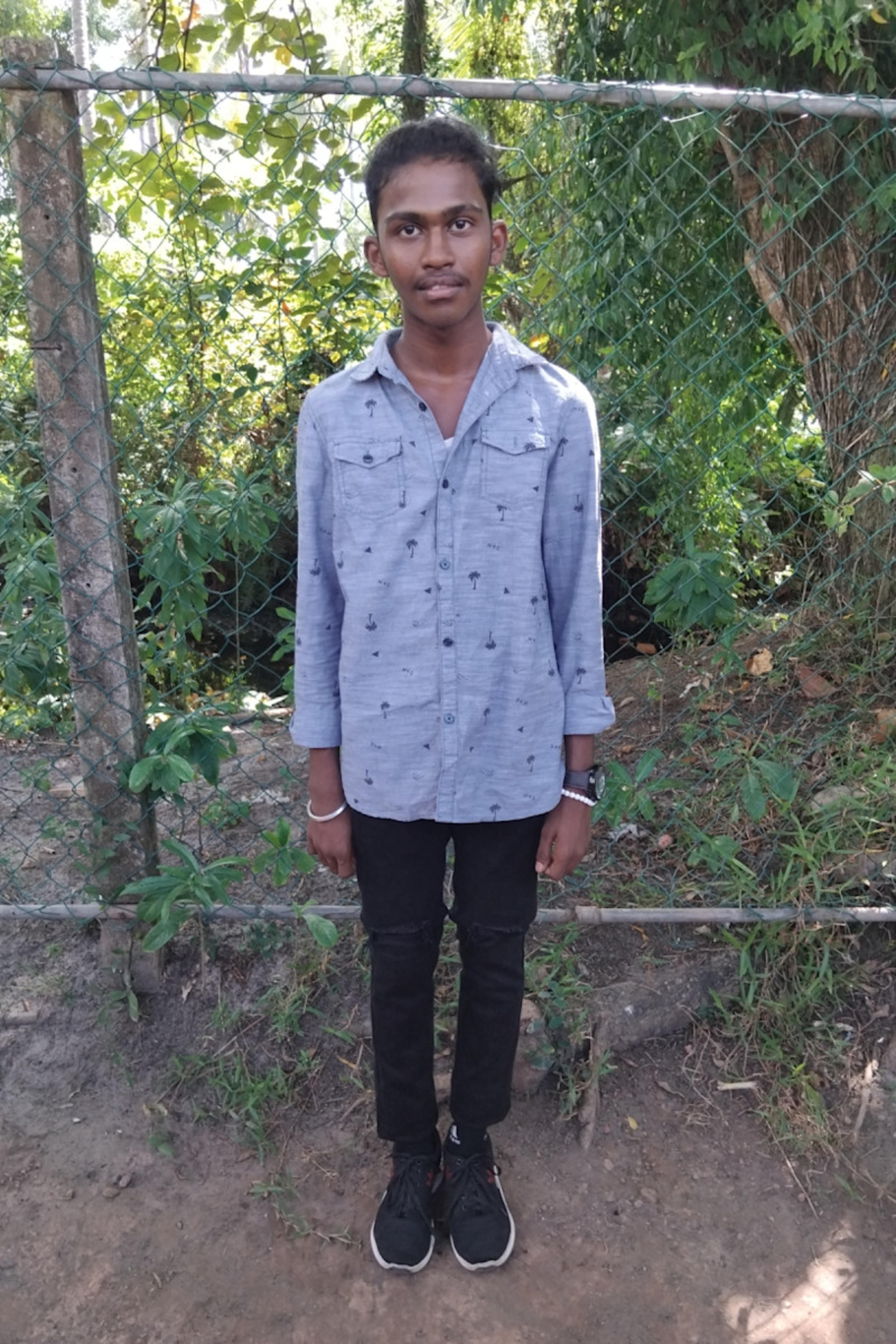 An unsponsored boy named Ashir from Sri Lanka who has waited 525 days for a sponsor.
