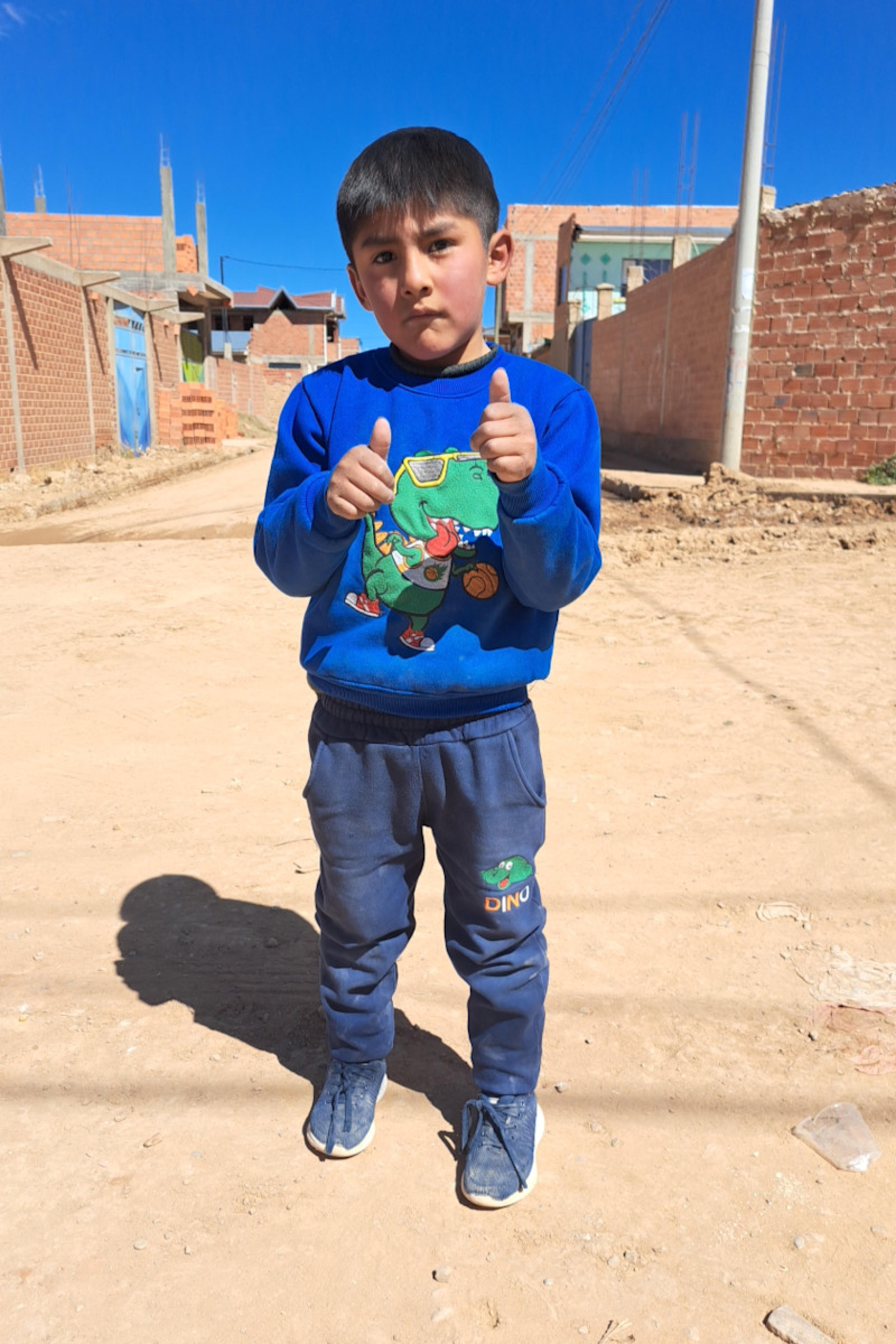 An unsponsored boy named Franco from Bolivia who has waited 580 days for a sponsor.